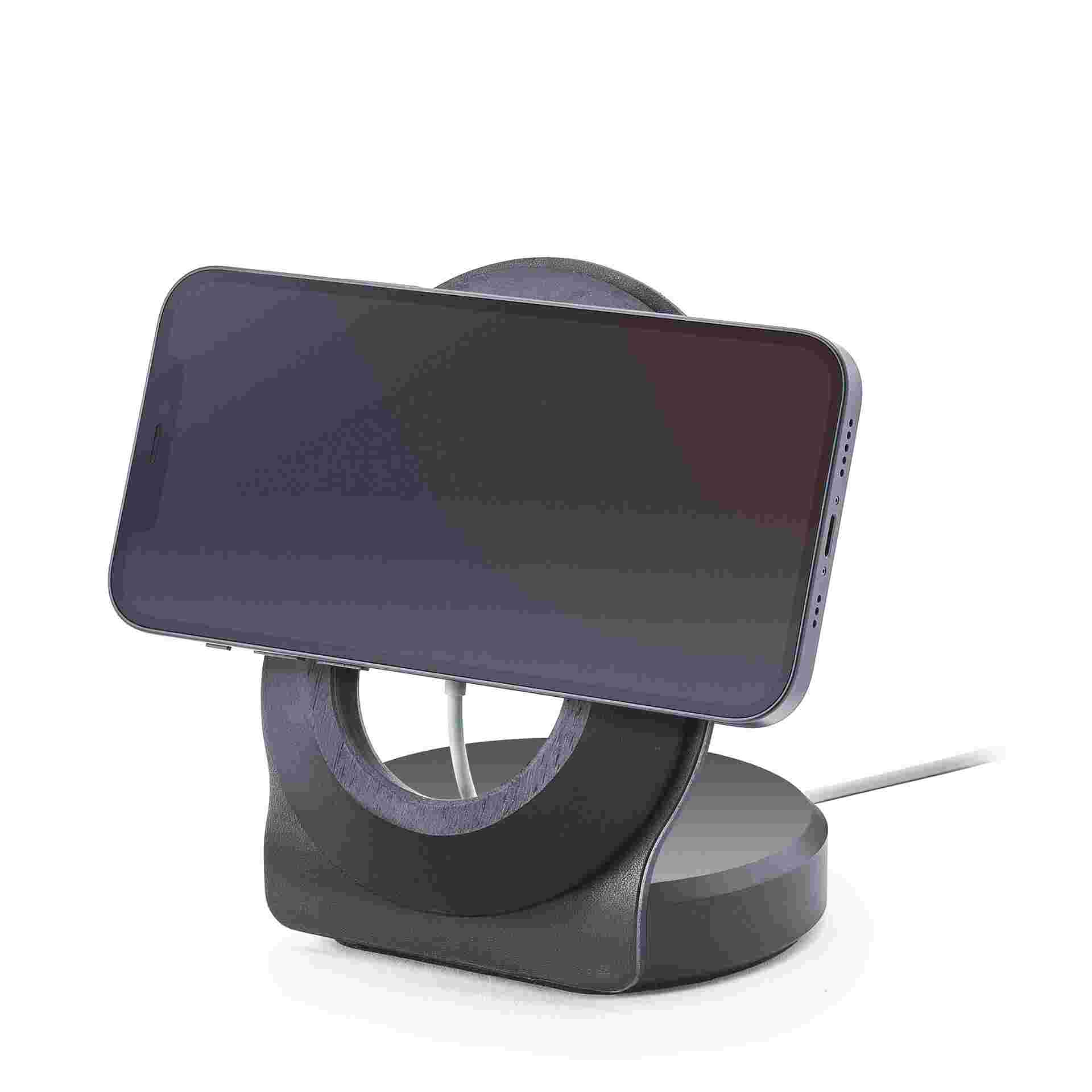 Blackened walnut and black leather MagSafe Dock for iPhone 12 in landscape mode.