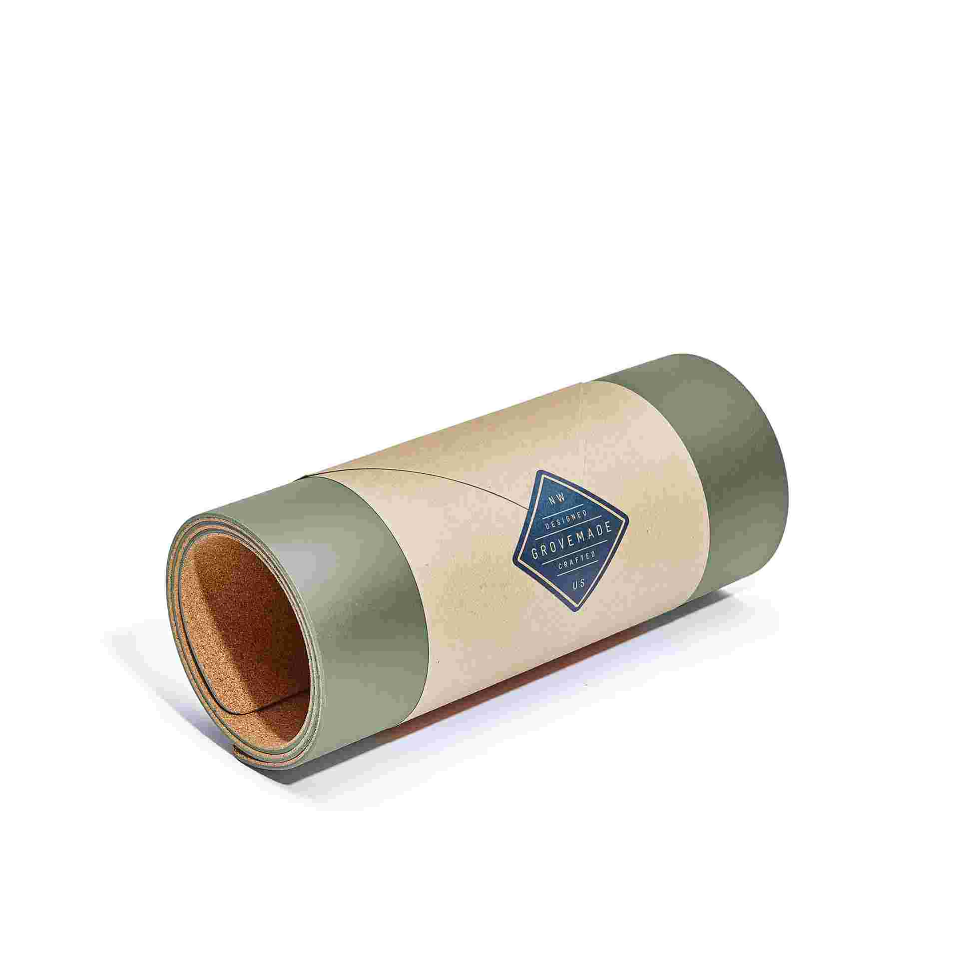 Medium Plus dark green desk pad, rolled in brown craft paper for easy gifting.