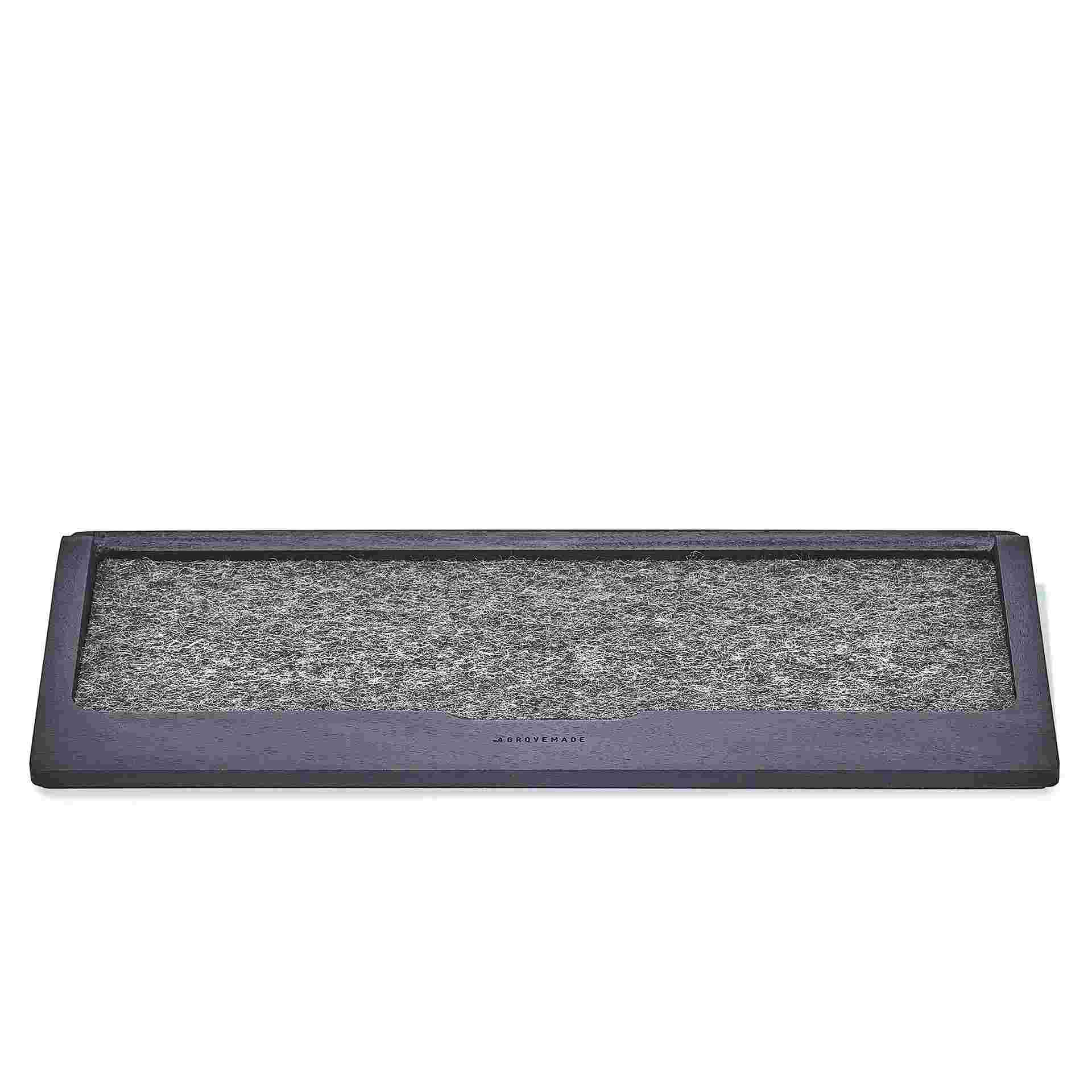 The Blackened Walnut Keyboard Tray with no keyboard, revealing the wool felt lining.
