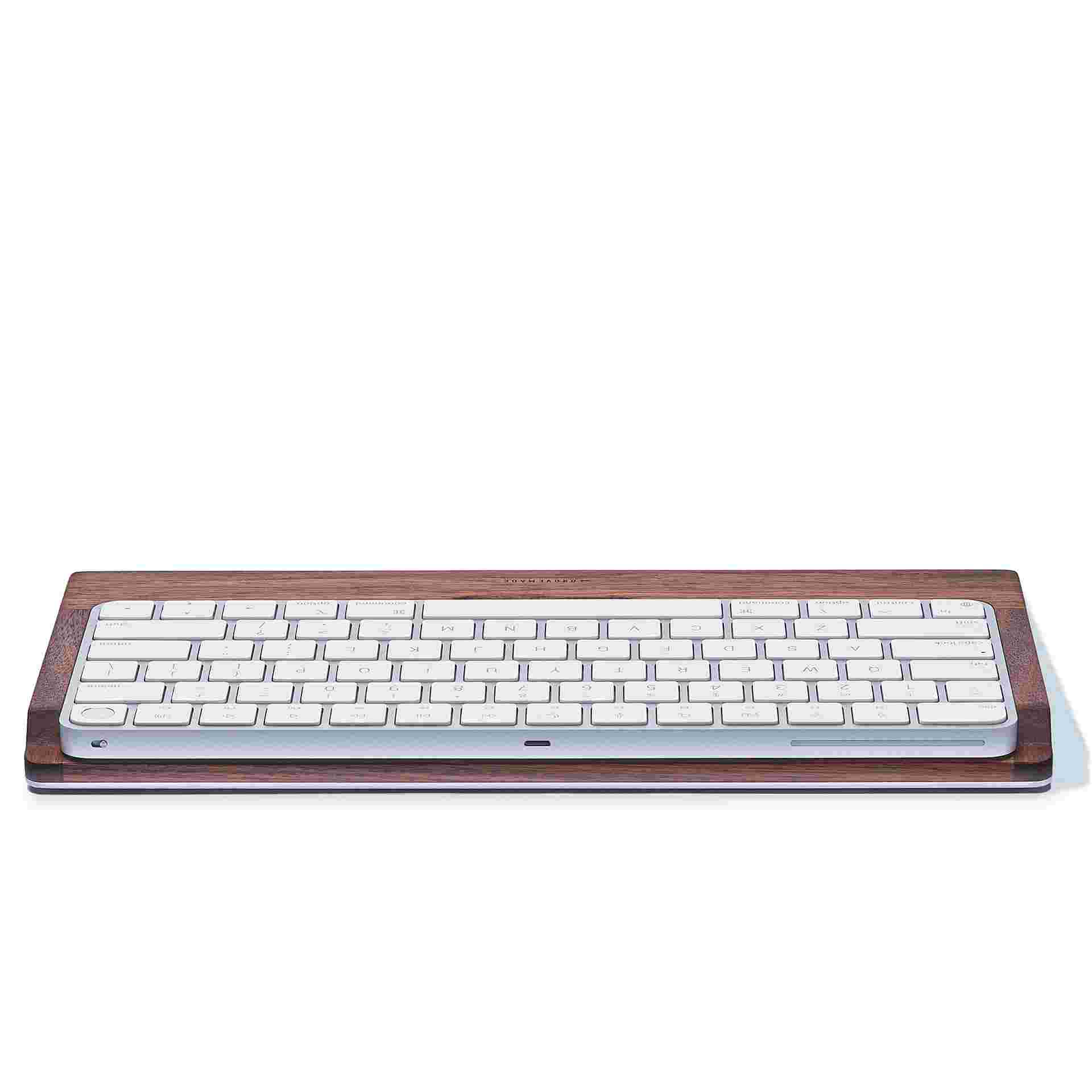 The Walnut Keyboard Tray with no keyboard, revealing the natural cork lining..