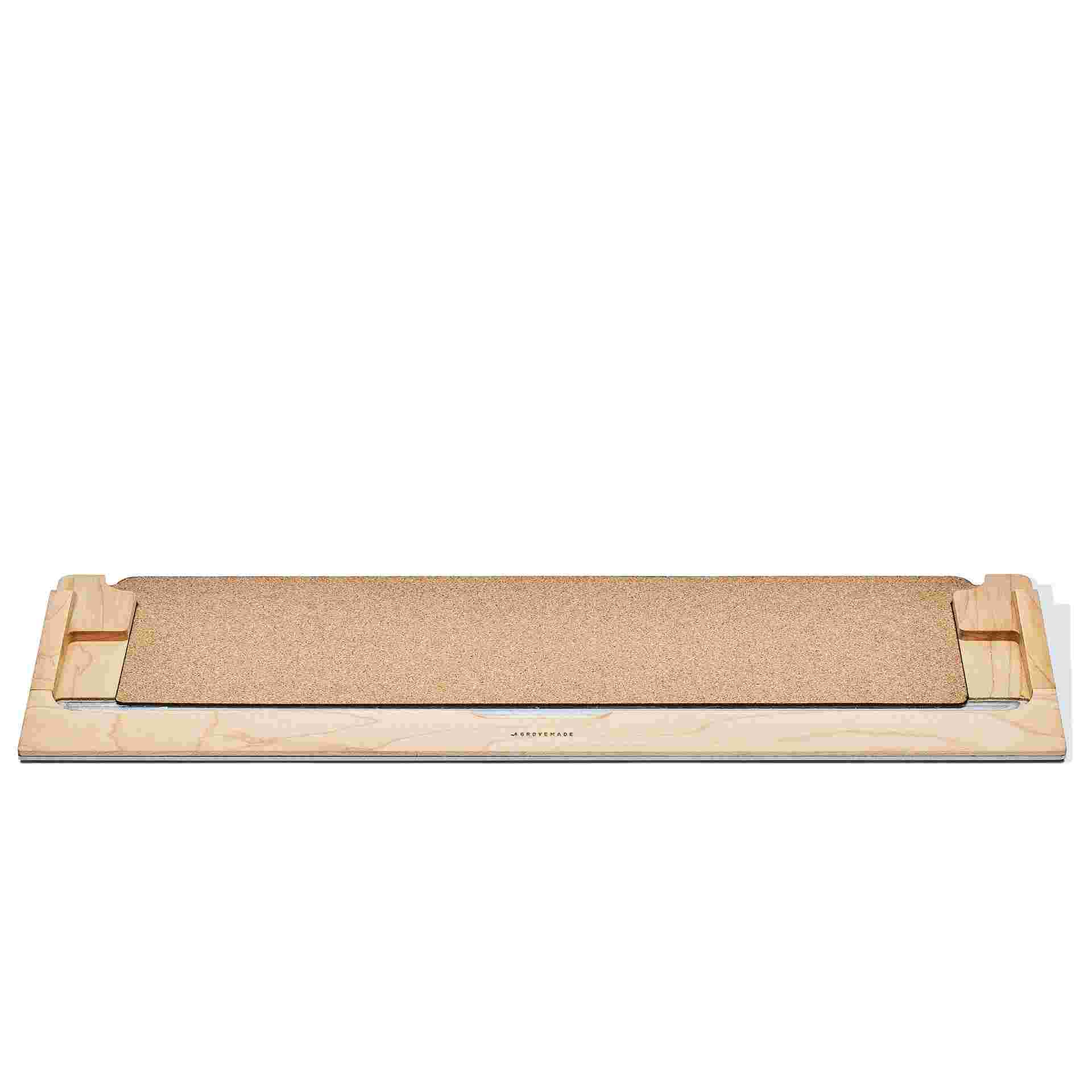 Empty Maple Keyboard tray showing natural cork lining.