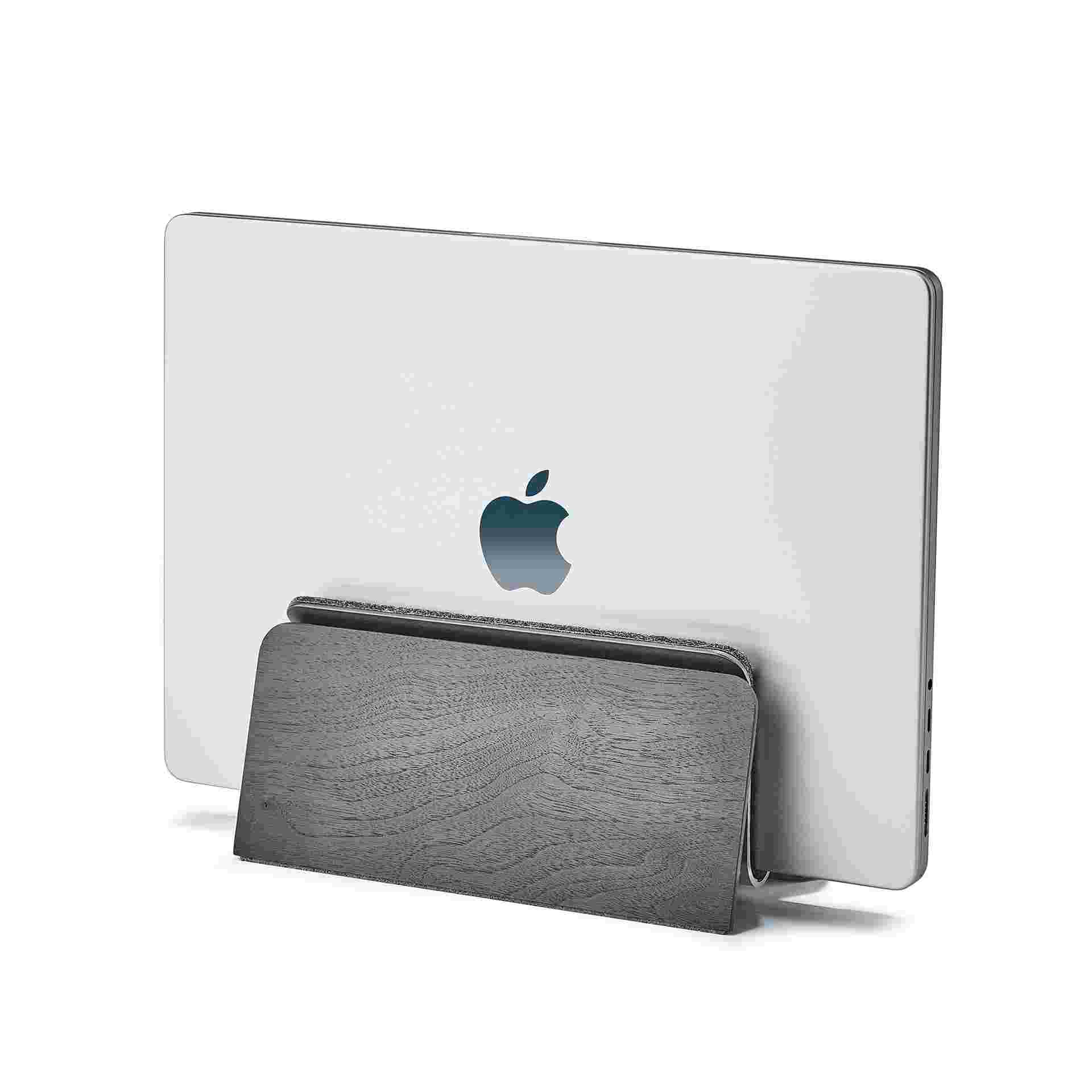 Vertical MacBook Pro 14 inch stand in blackened walnut.
