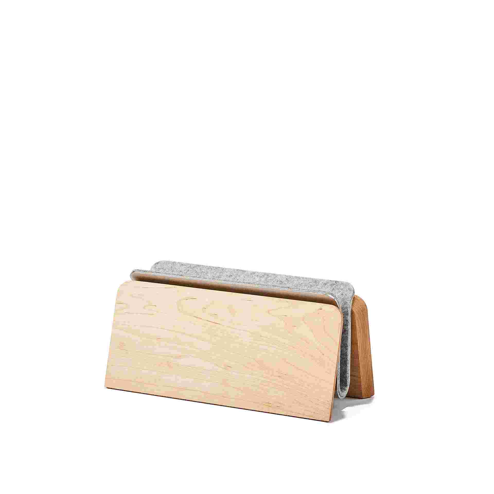 Vertical MacBook Pro Dock in maple.