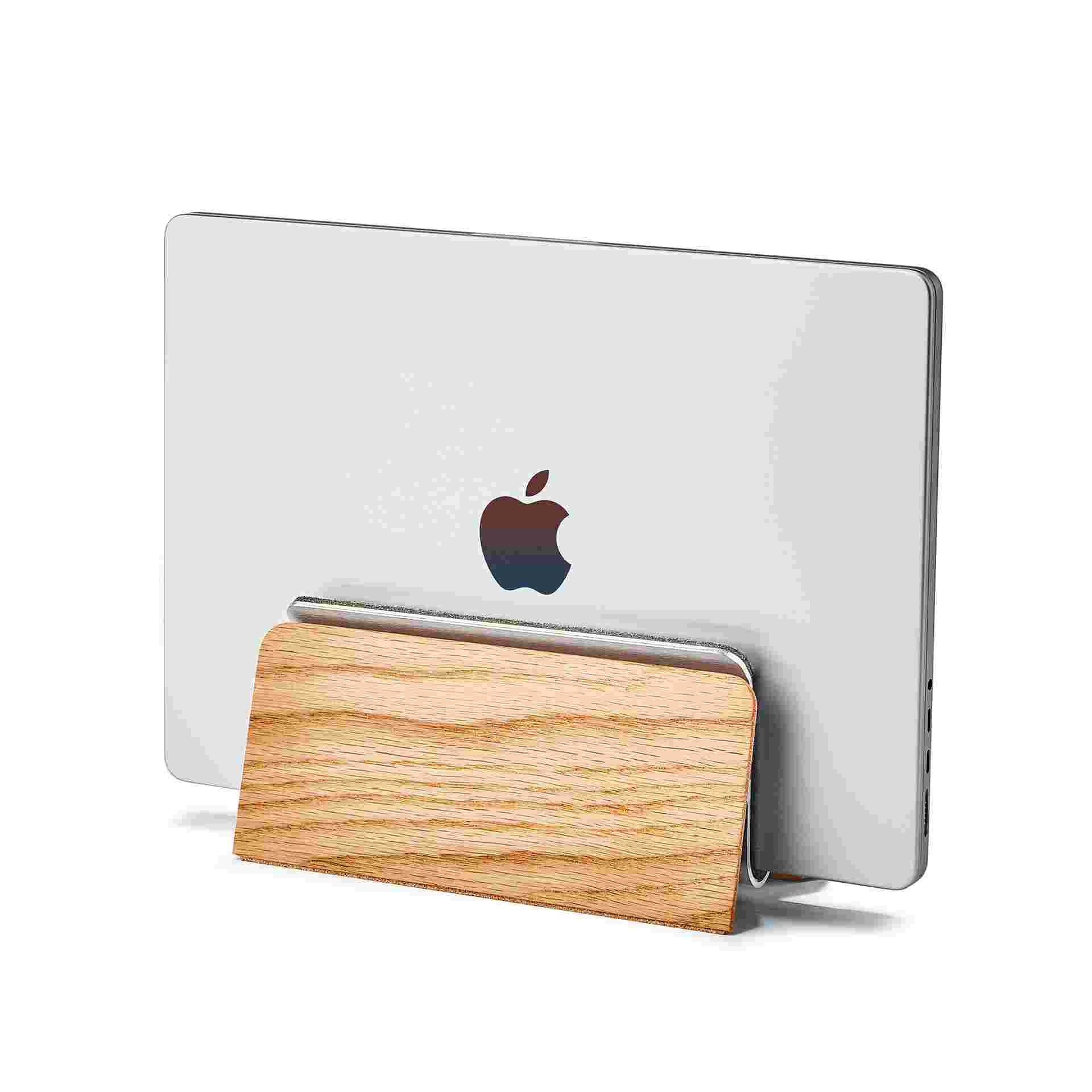 Vertical MacBook Pro 14 inch stand in oak.