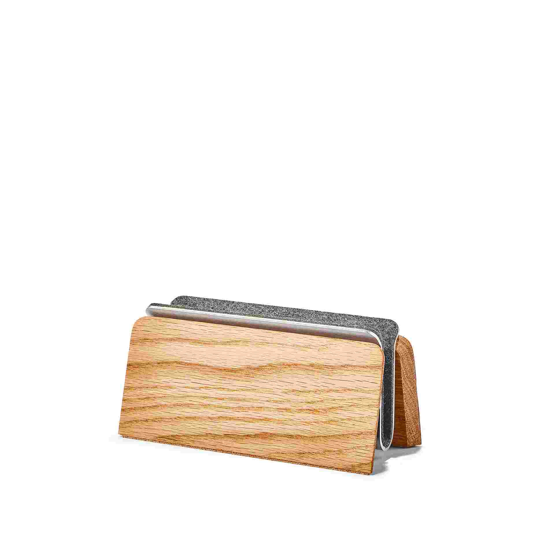 Vertical MacBook Pro Dock in oak.