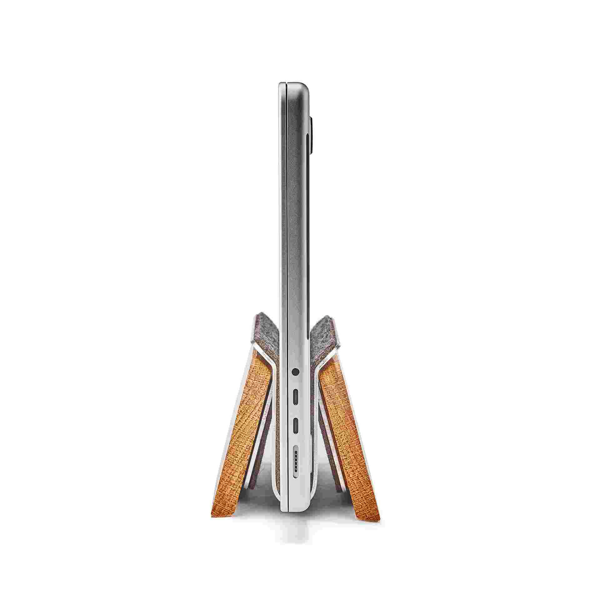Profile of Oak MacBook Dock with 16 inch MacBook Pro.