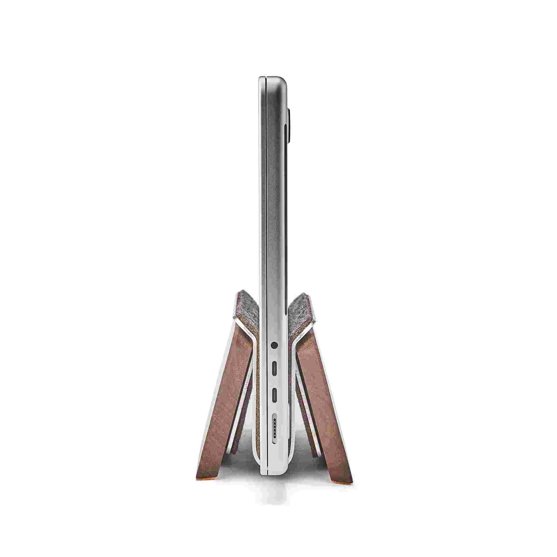 Profile of Walnut MacBook Dock with 16 inch MacBook Pro.