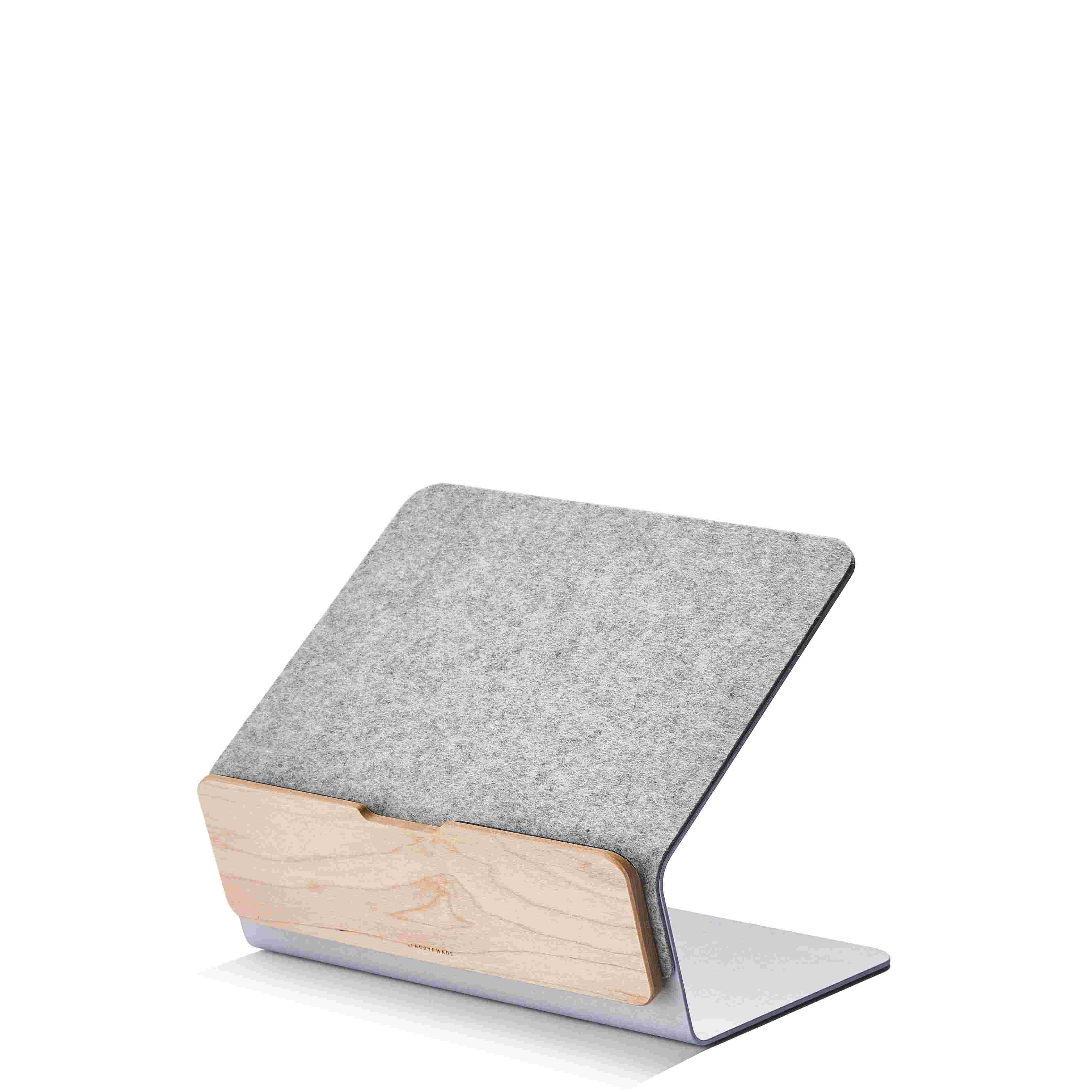 Maple laptop stand with wool felt lining.