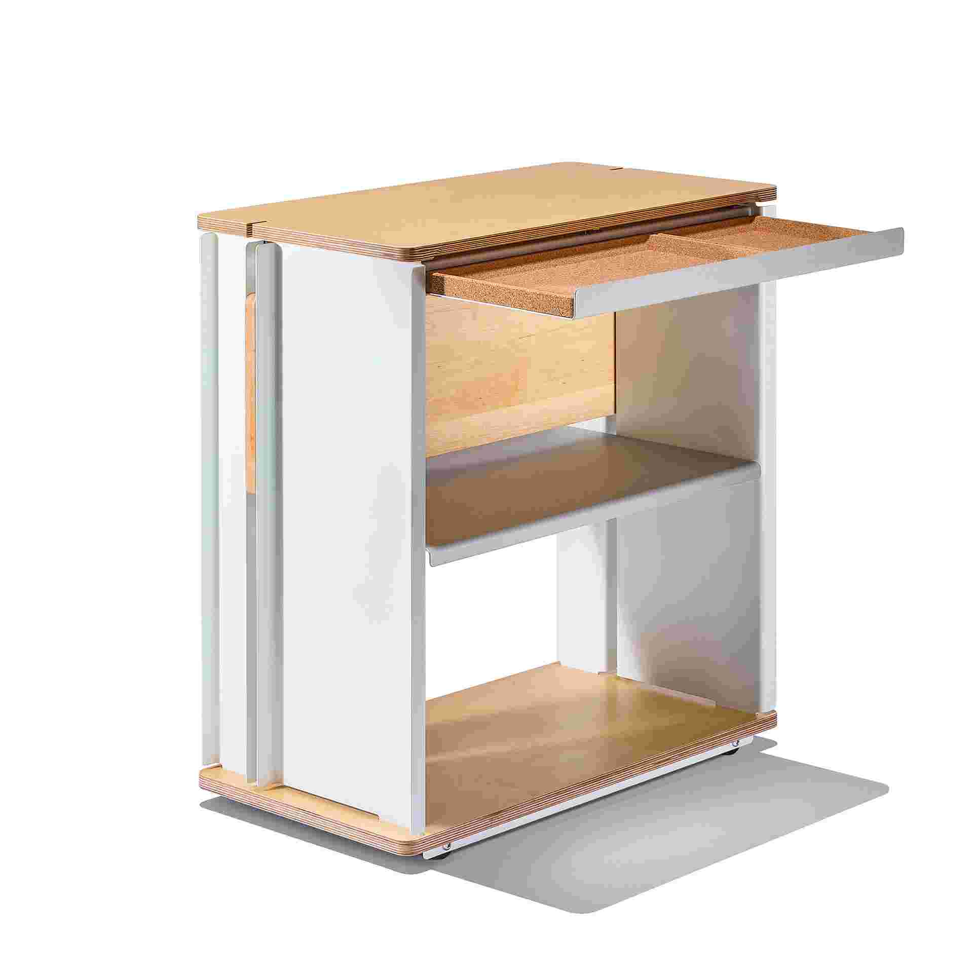 3/4 view of maple plywood desk cart with cork drawer extended.