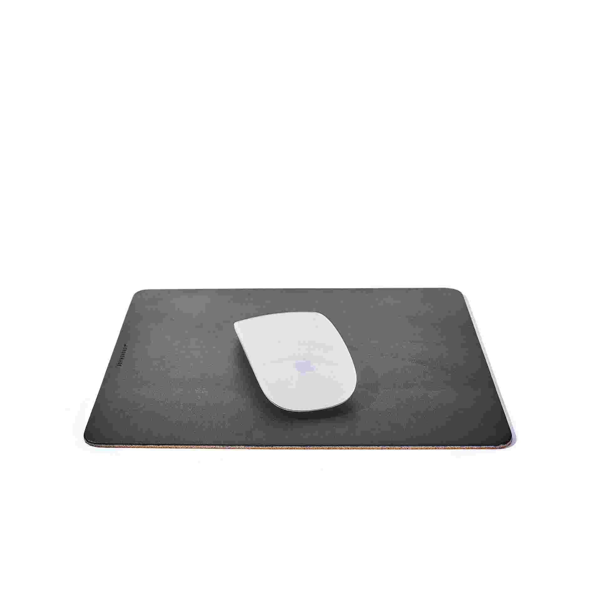Premium black leather mouse pad, measuring 7.5 inches by 9 inches.