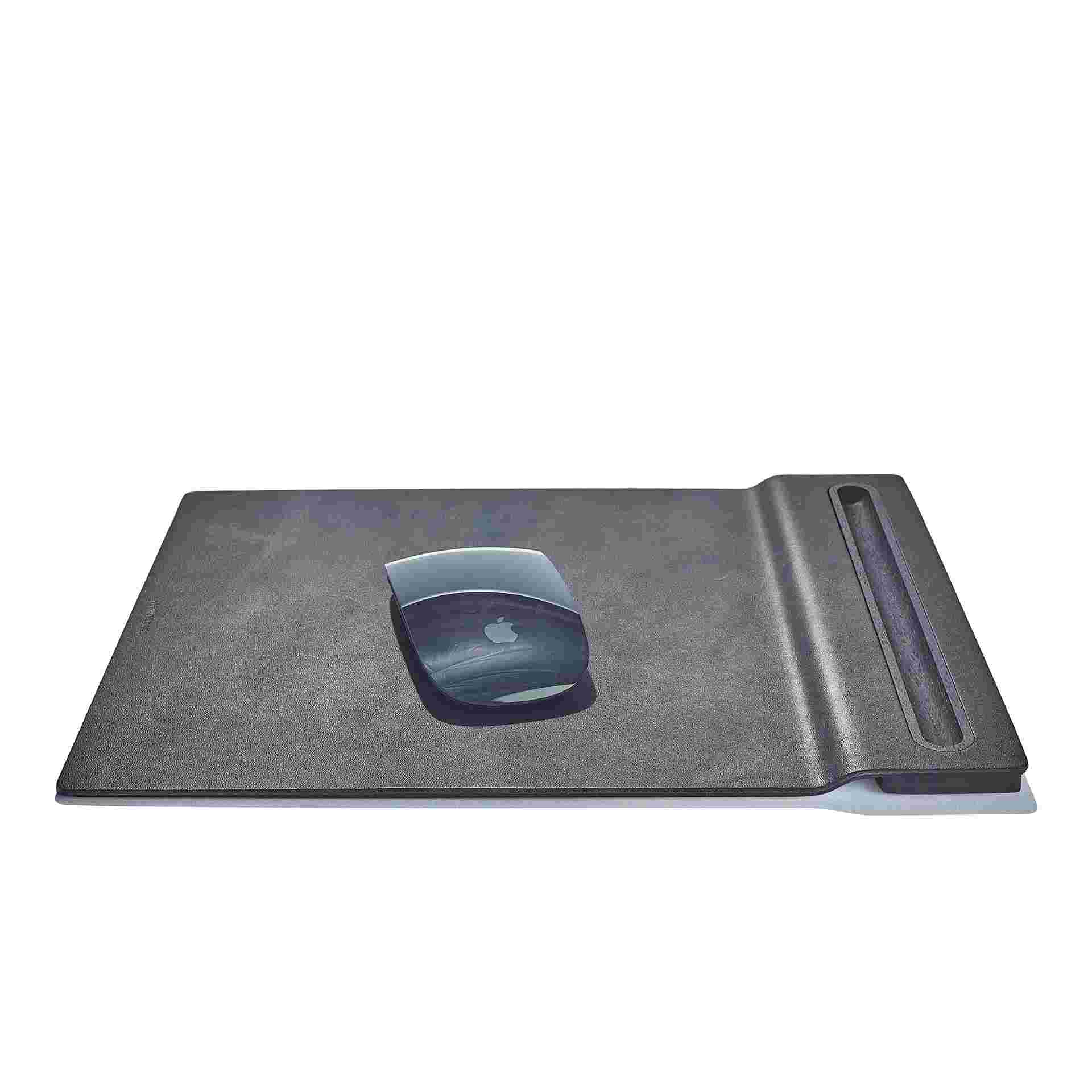 The Leather and Blackened Walnut Mouse Pad in use with the Apple Magic Mouse 2.
