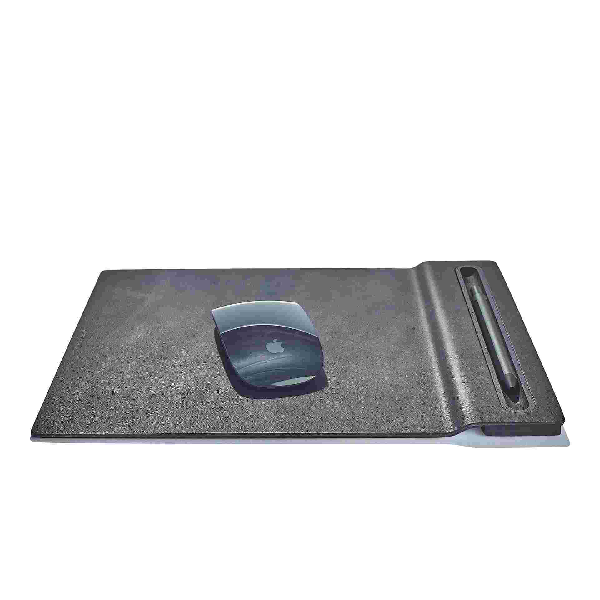 The mouse pad's integrated blackened walnut tray securing a pen or stylus.