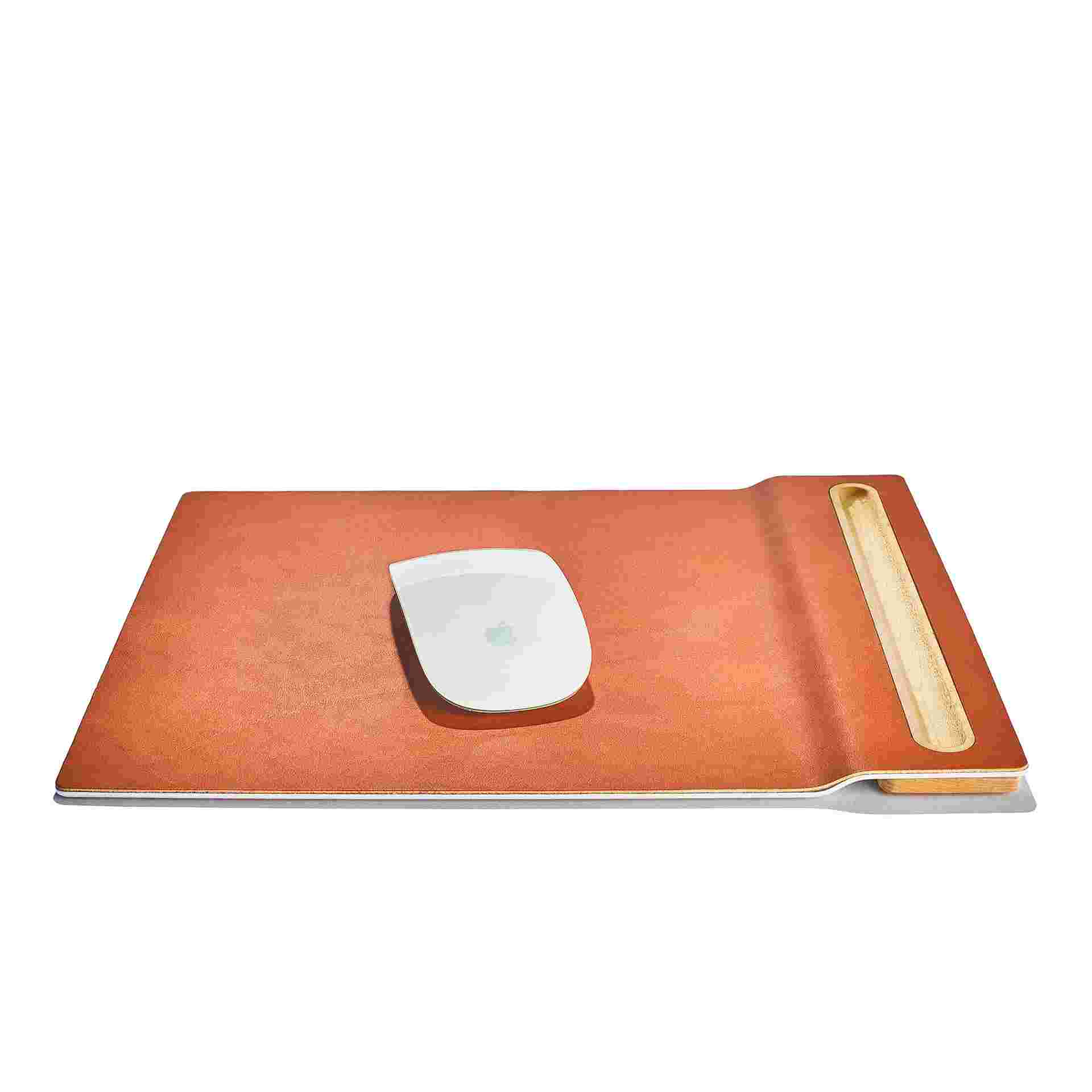 The mouse pad's integrated maple tray securing a pen or stylus.