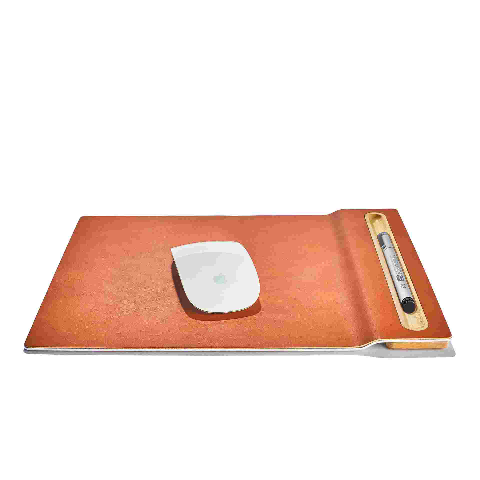 The Leather and Maple Mouse Pad in use with the Apple Magic Mouse 2.
