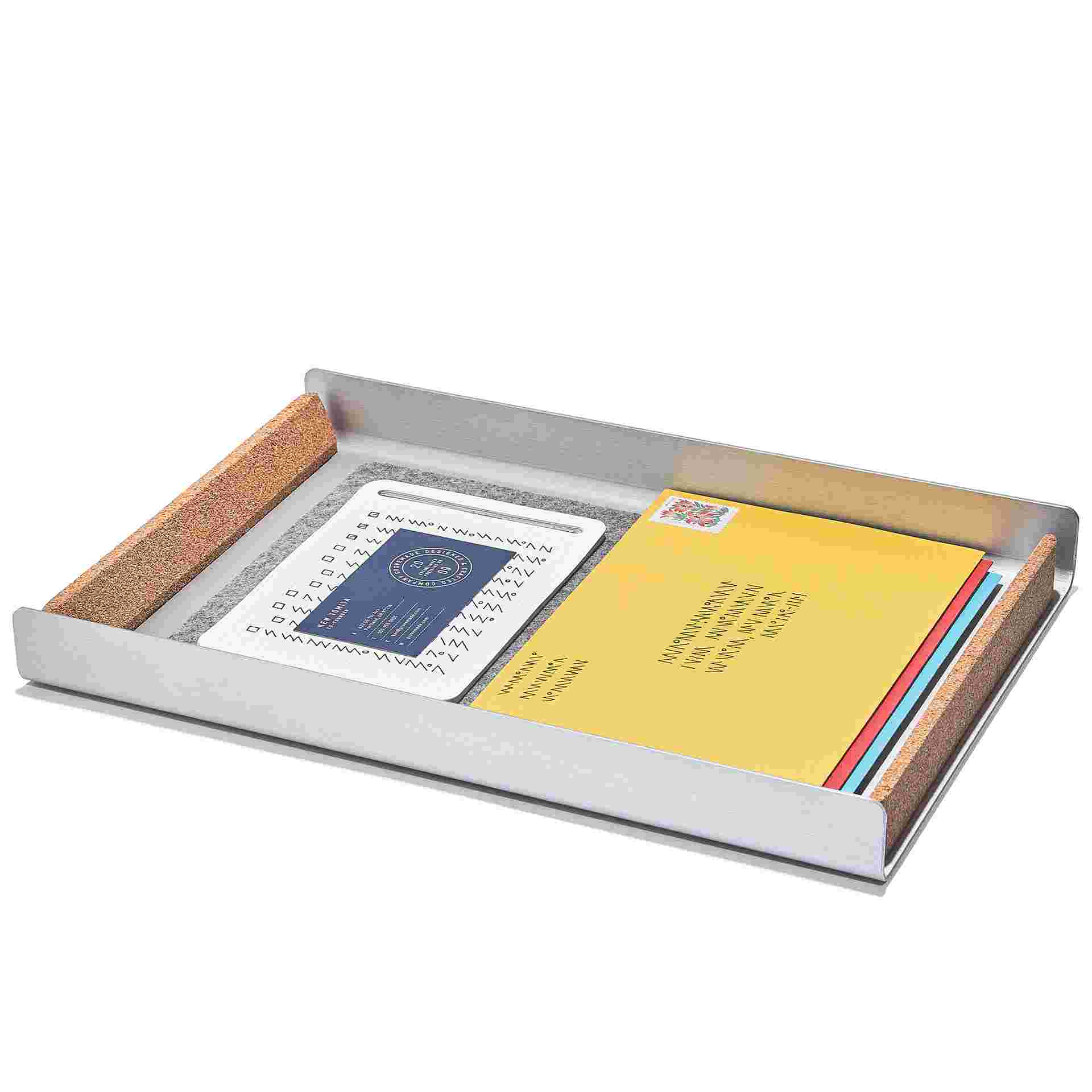 Light paper tray with miscellaneous letters and notes.