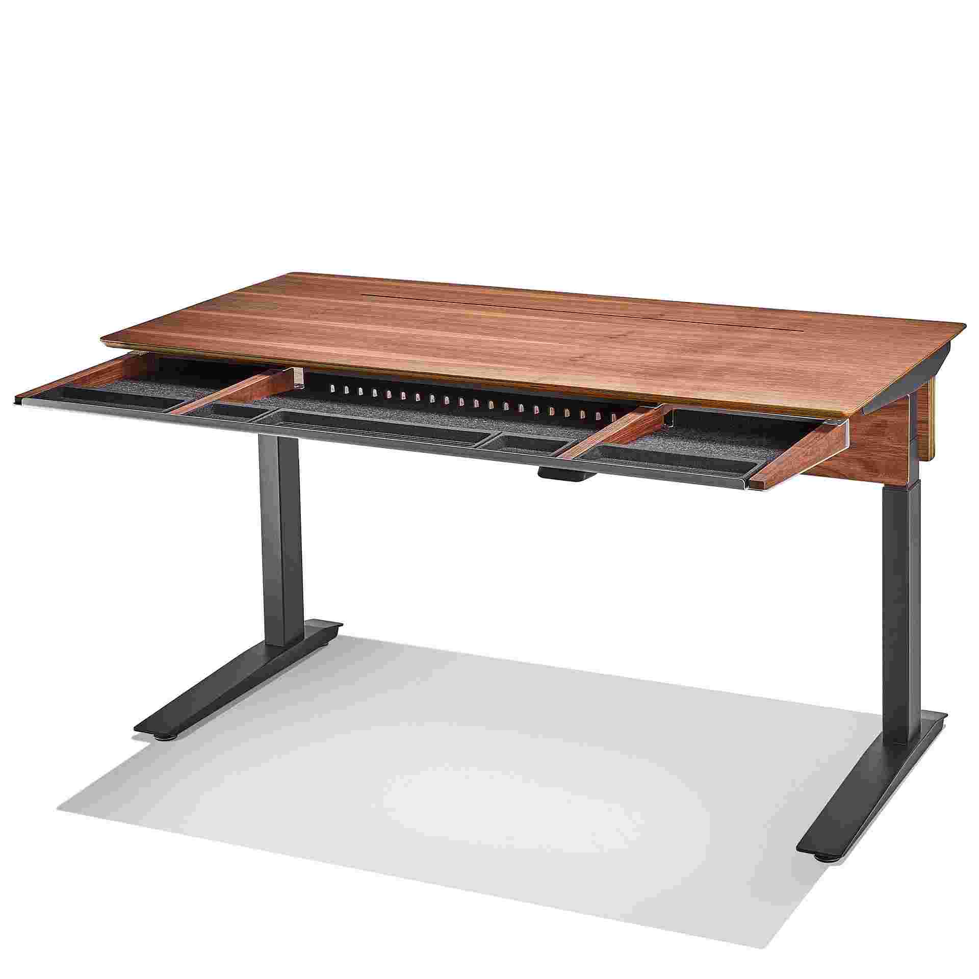 3/4 view of the walnut plywood desk with full-width drawer pulled out.