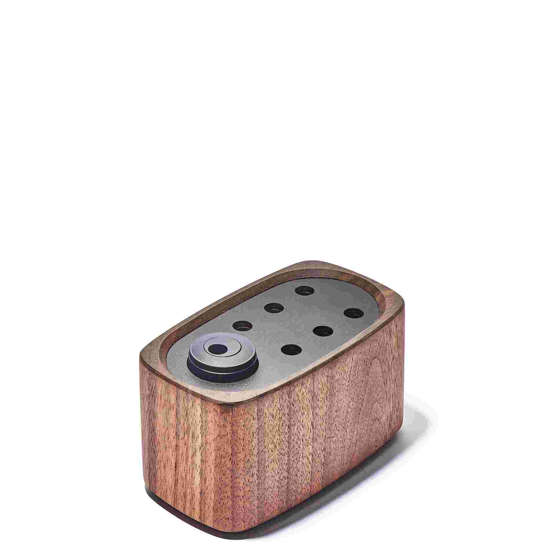 Empty walnut pencil stand.