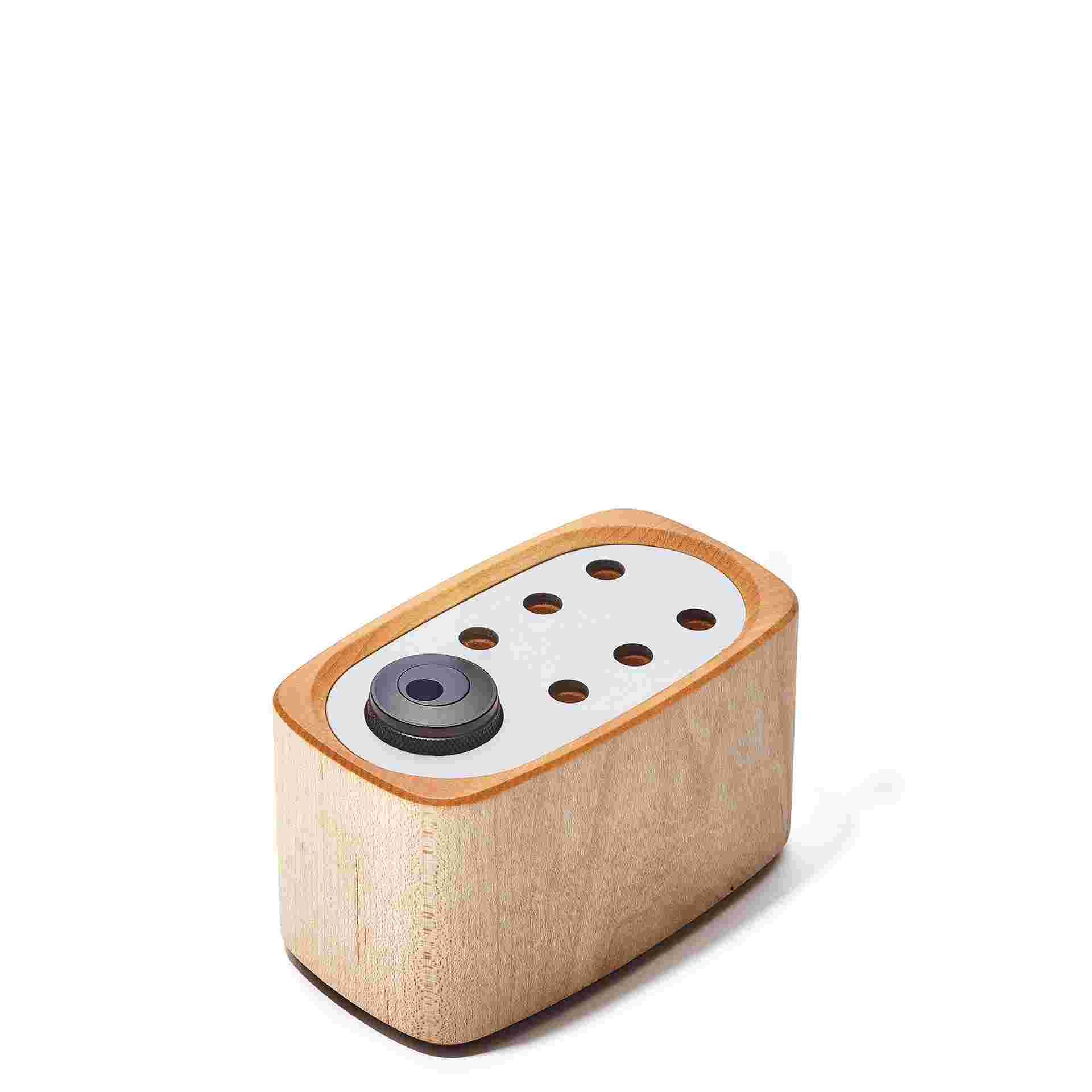 Empty maple pencil stand.