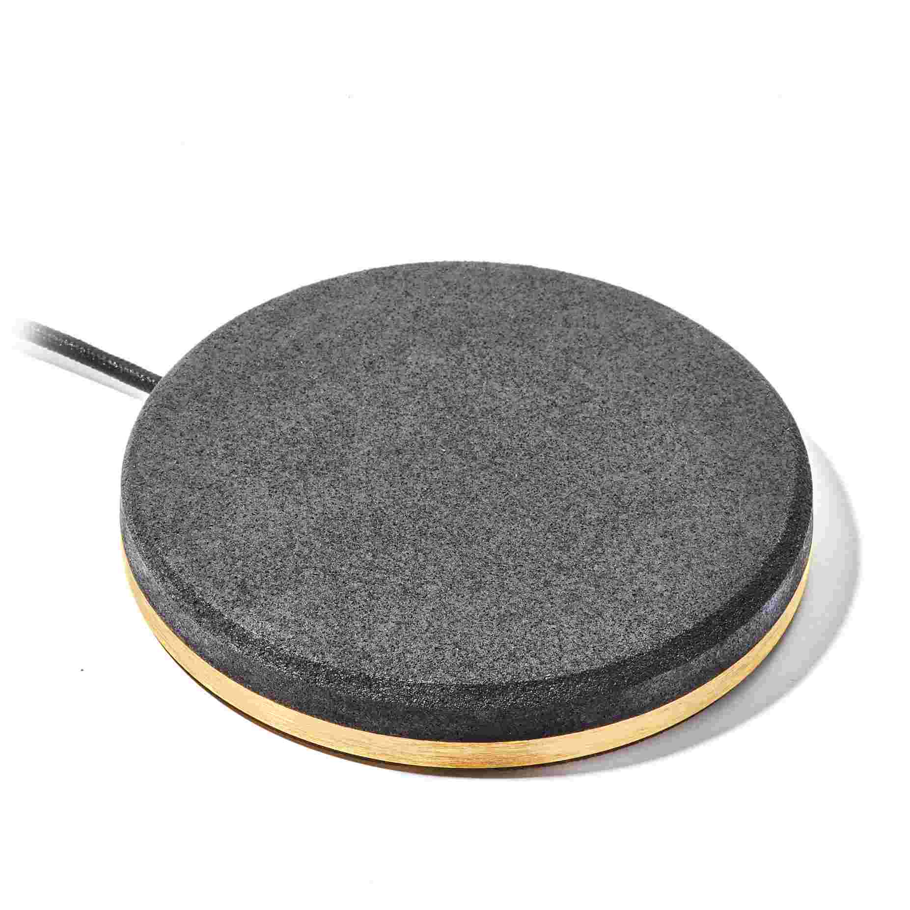 The soft top of the hand painted black cork iPhone Charging Dock with brass base.