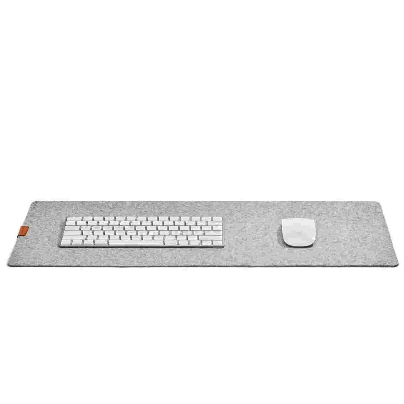 The Small Wool Felt Desk Pad in light grey with the Apple Magic Keyboard and Apple Mouse.
