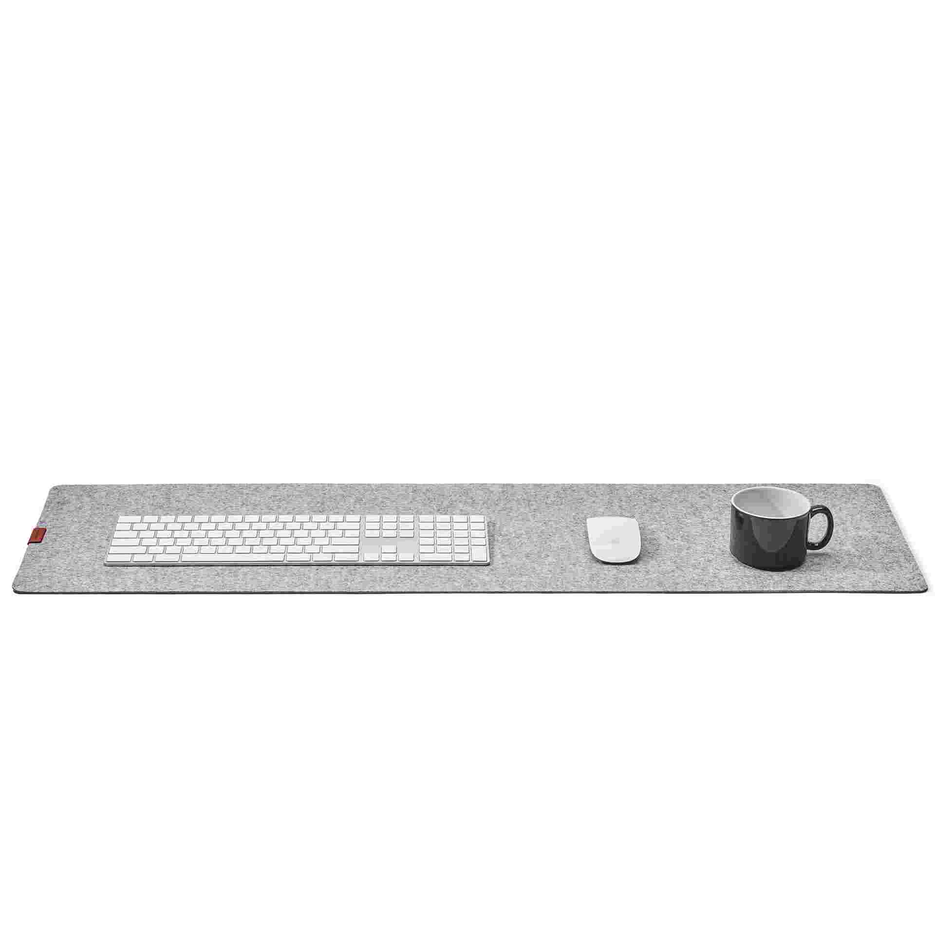 The Medium Wool Felt Desk Pad in light grey with the Apple Magic Keyboard with Numeric Keypad and Apple Mouse.