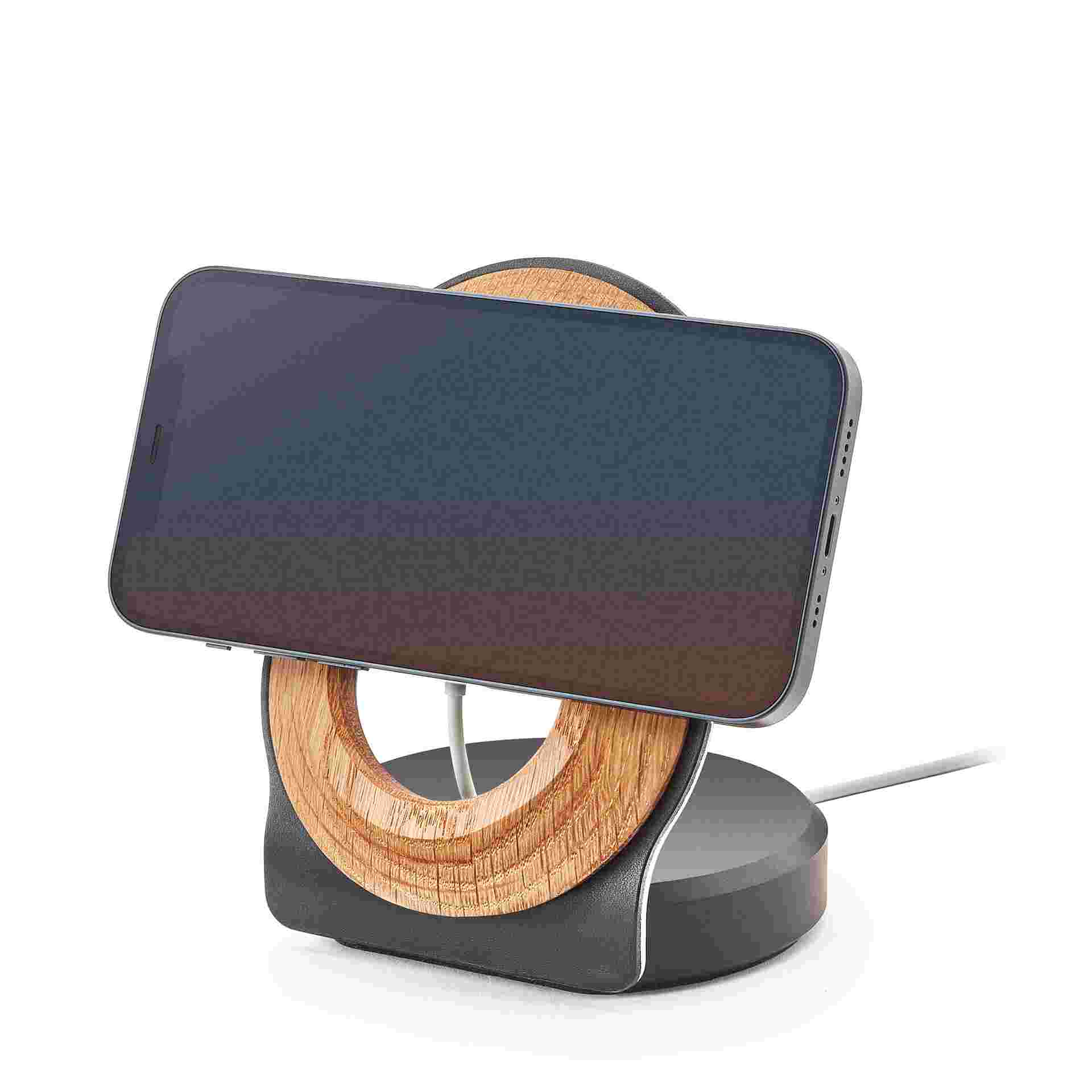 Oak and black leather MagSafe Dock for iPhone 12 in landscape mode.