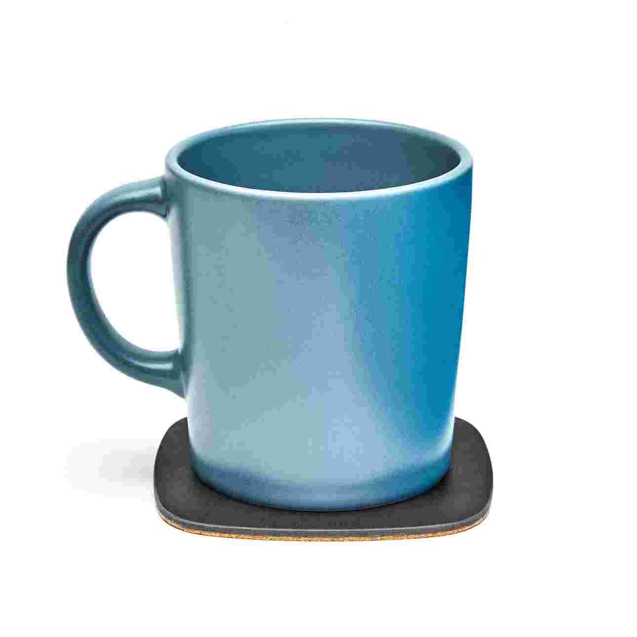 Matte black coaster with blue coffee cup.