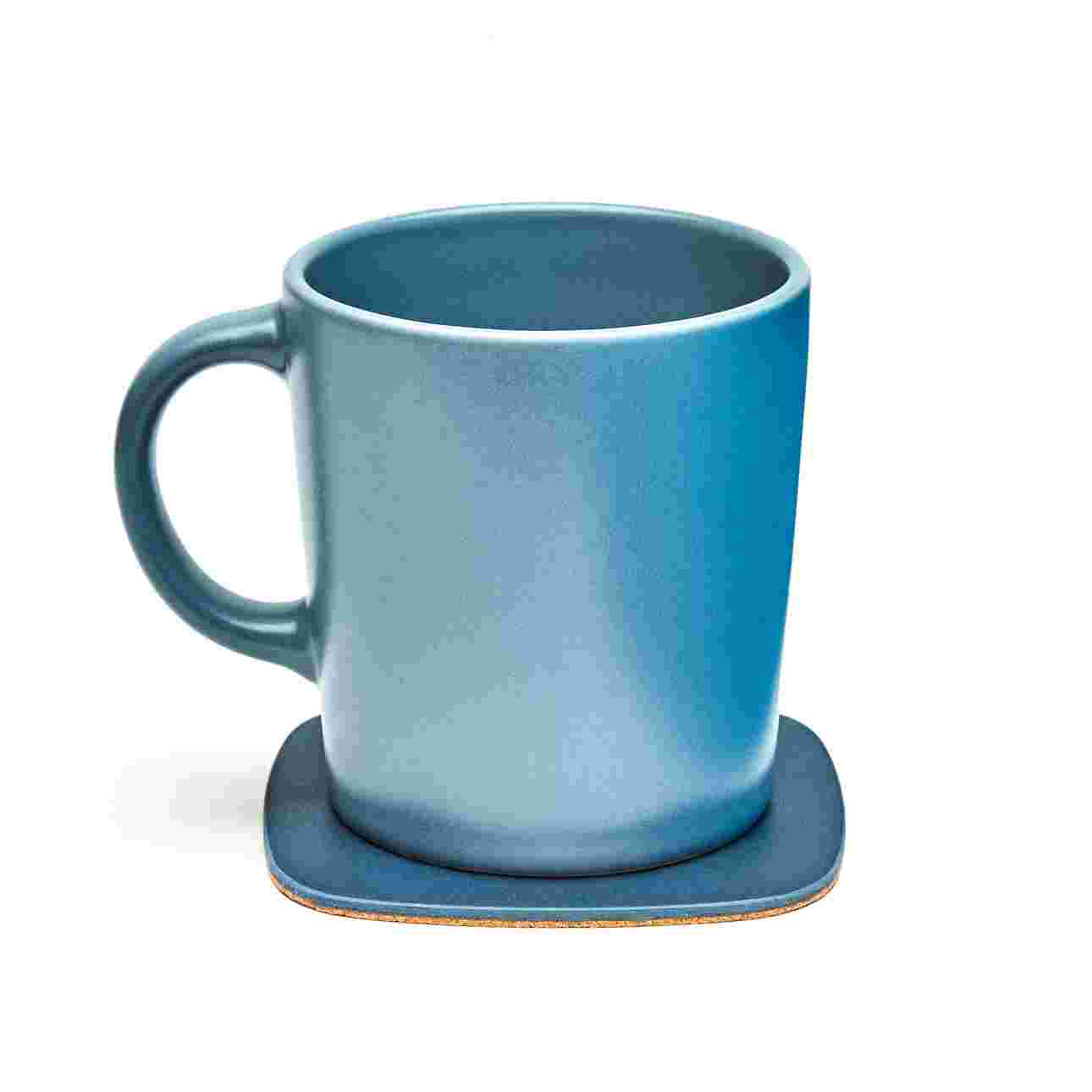 Matte navy blue coaster with blue coffee cup.