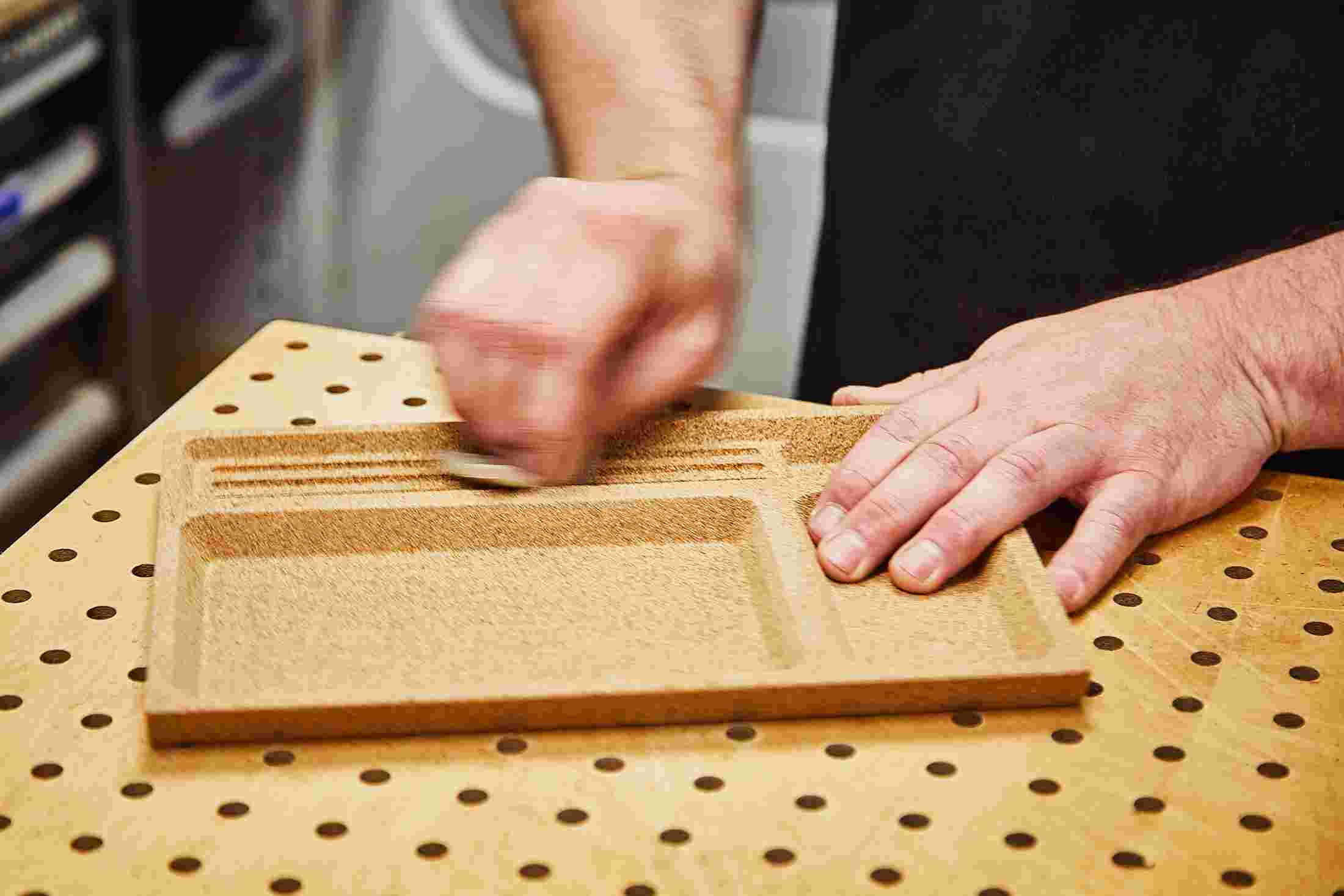 Closeup of the Cork Desk Tray organizer in production in the Grovemade wood shop.