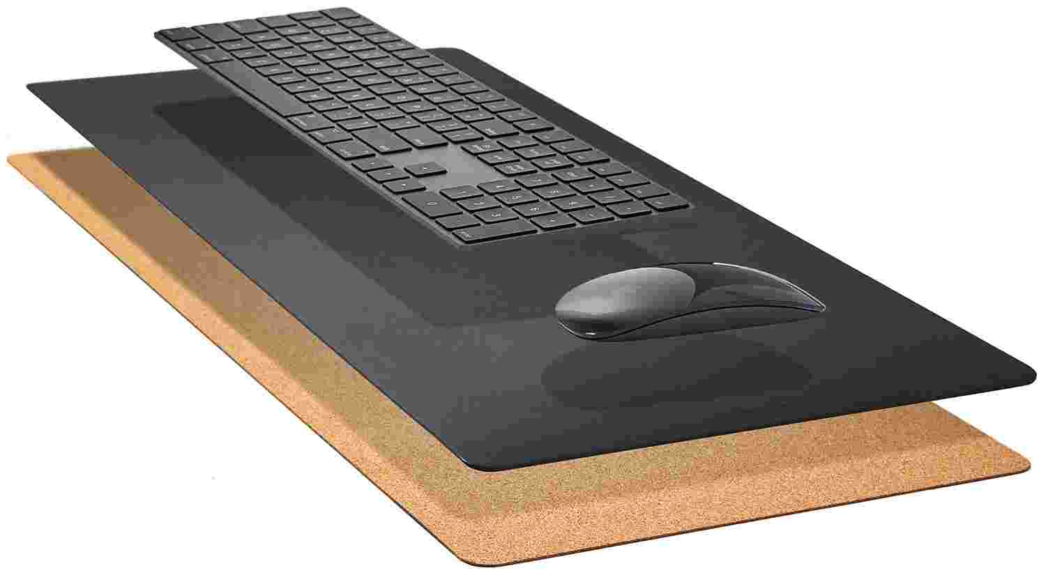 Exploded, cross-section view of the Matte Black Desk Pad showing the layering of cork and all-natural linoleum.