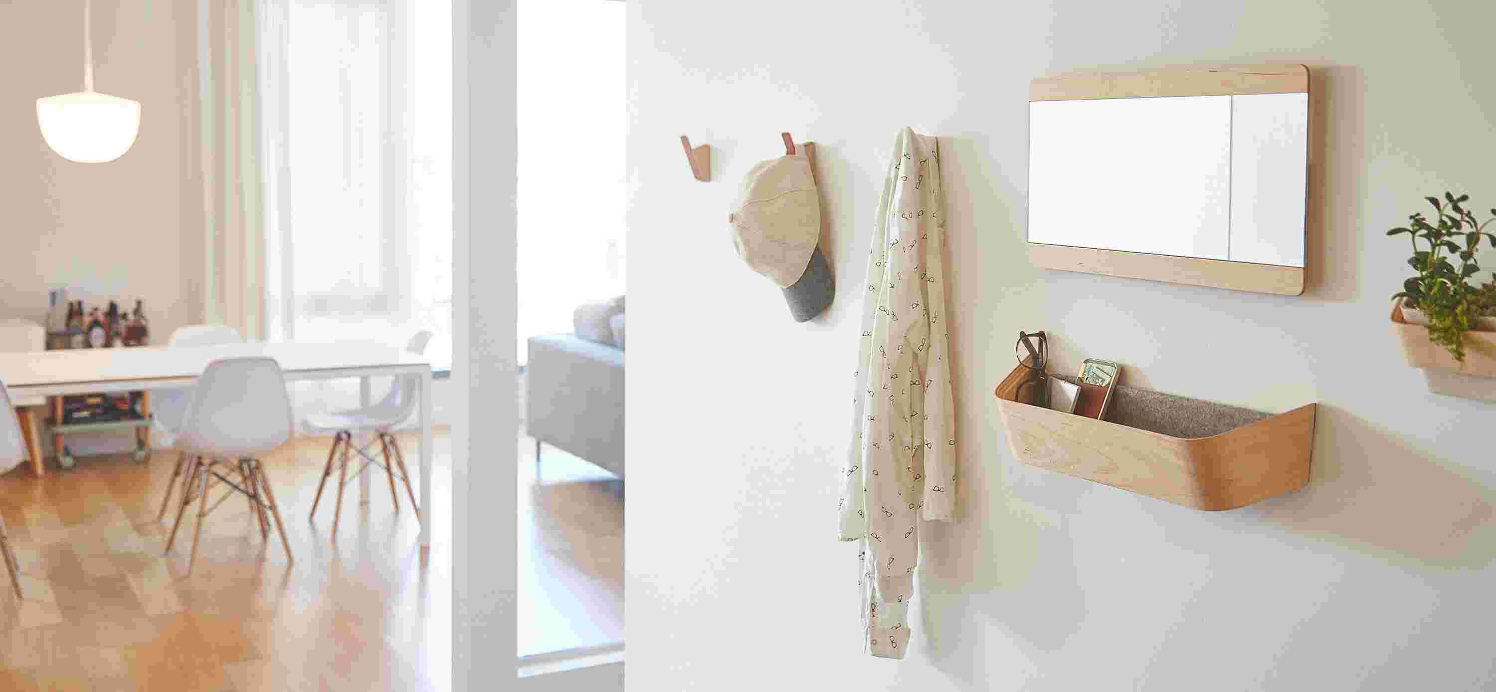 Wall-mounted entryway collection in maple—wall hooks, mirror, succulent planter, and catch-all.