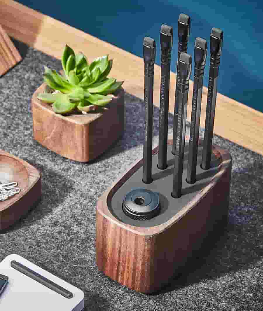 The Grovemade X Blackwing walnut pencil holder and custom pencils.