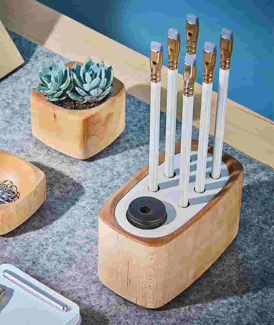 The Grovemade X Blackwing walnut pencil holder and custom pencils.