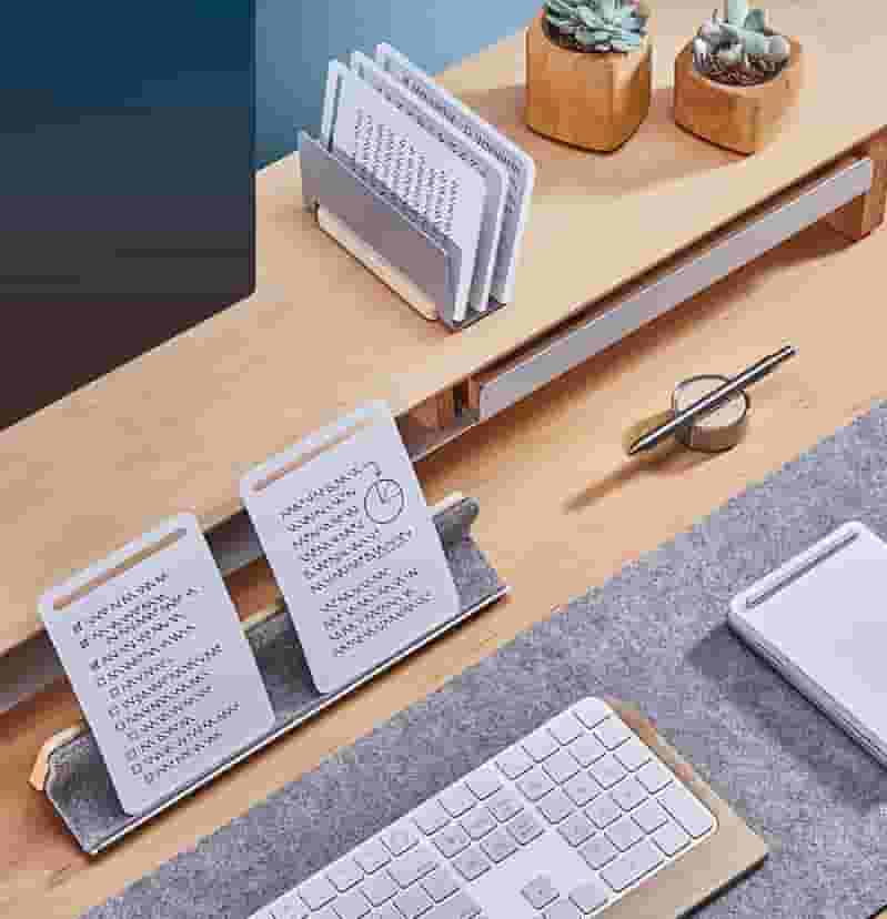The walnut note-taking kit with matching desk shelf and desk pad.