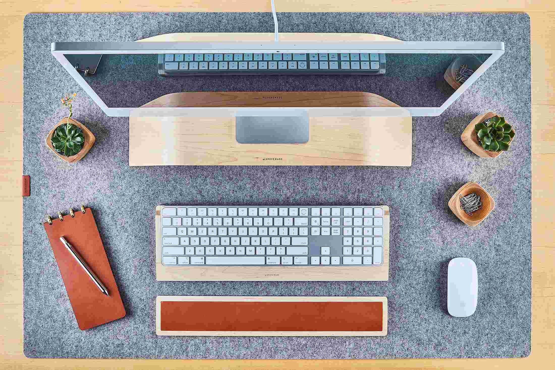 Overhead of the Maple Desk Collection on the Large Wool Felt Desk Pad in Light Grey.