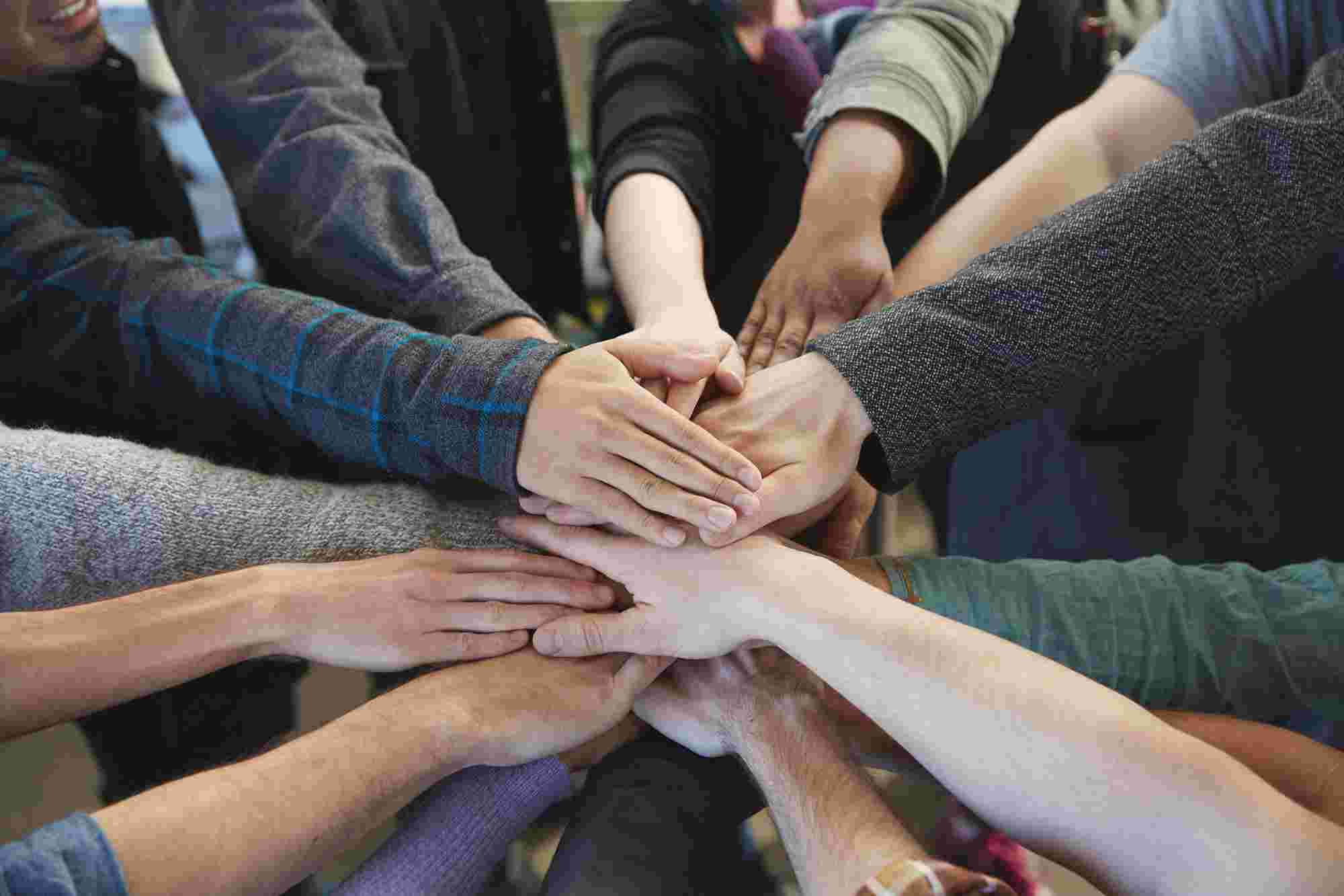 hands coming together