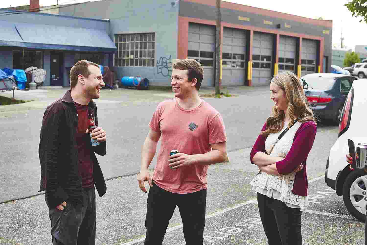 A few members of the Grovemade team chat outside.