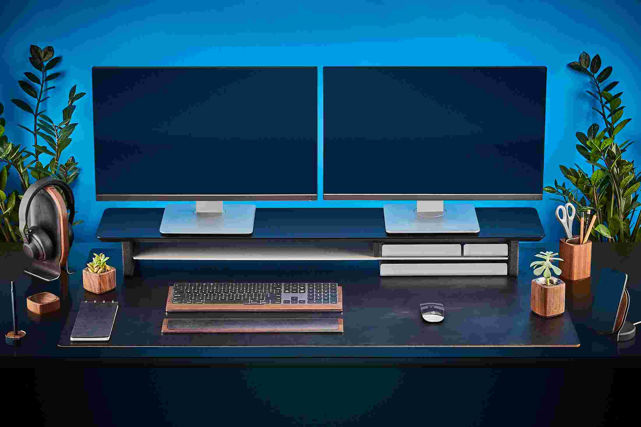 The Extra Large Felt Desk Pad supporting the entire Matte Black Desk Shelf System featuring premium black leather mouse pad and keyboard tray.