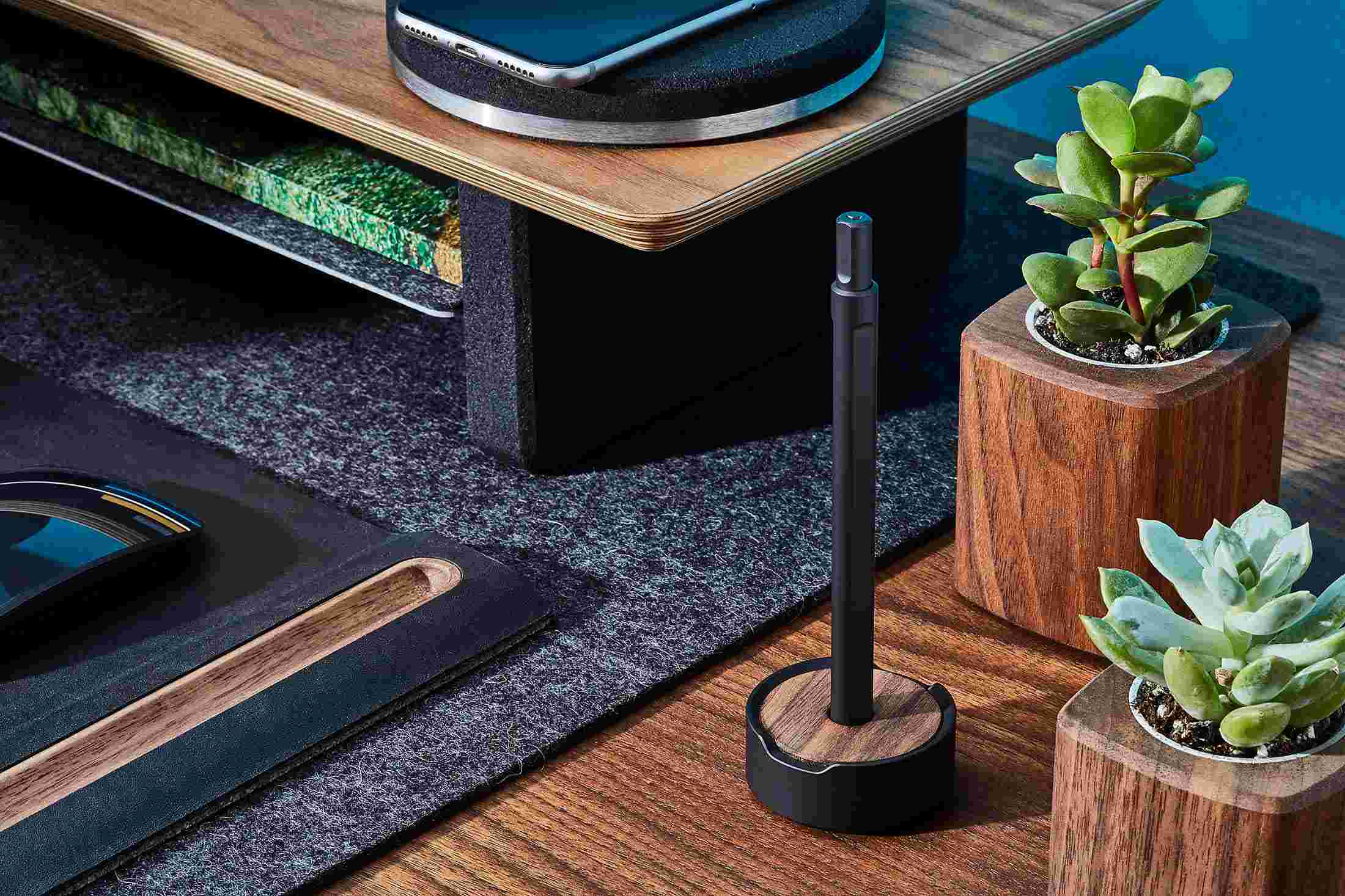 The Grovemade Black Pen and Walnut Pen Stand among the rest of the Grovemade Desk Collection.