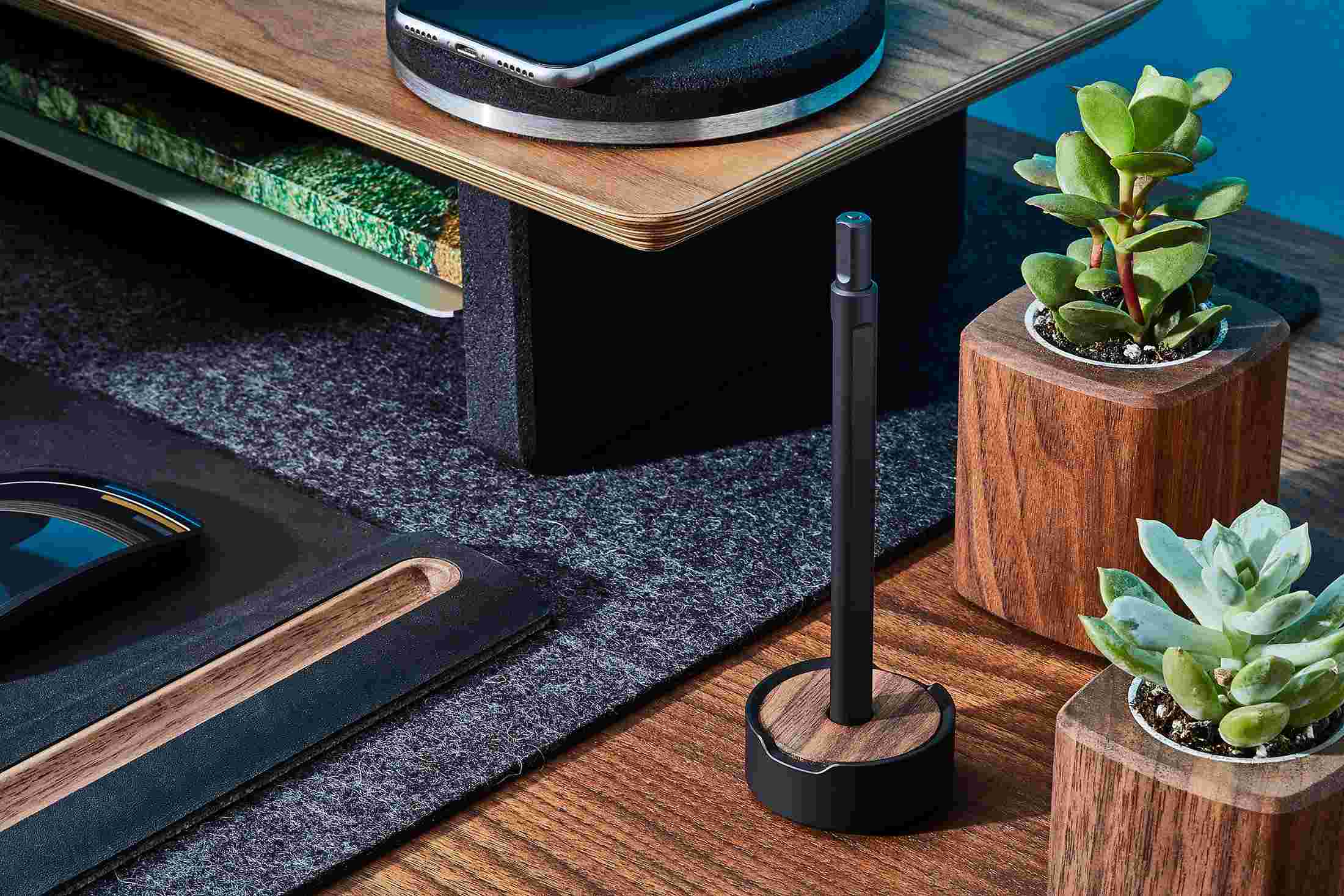 The Grovemade Black Pen and Walnut Pen Stand among the rest of the Grovemade Desk Collection.