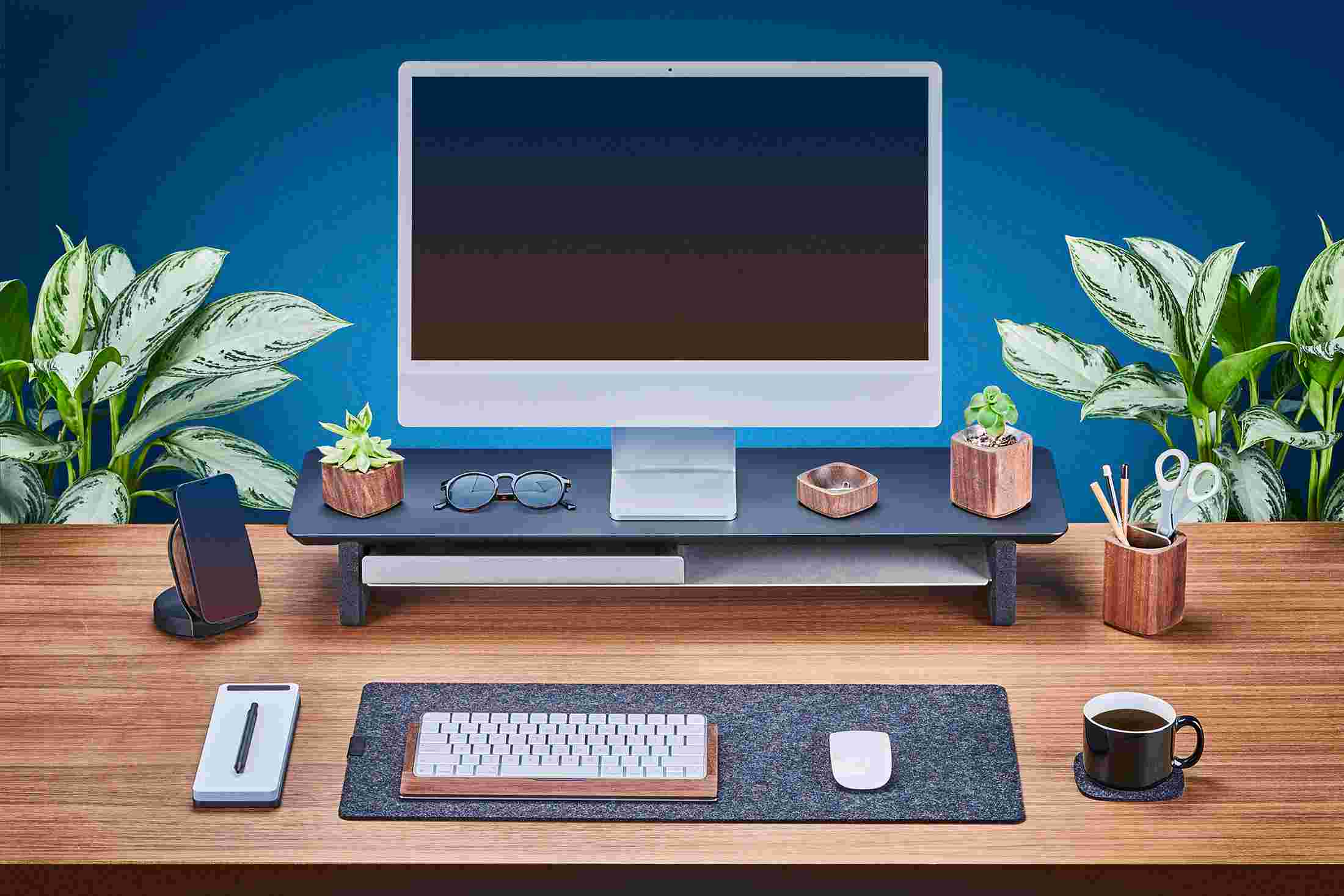 Medium Matte Black Desk Shelf shown with 24 inch Apple iMac.