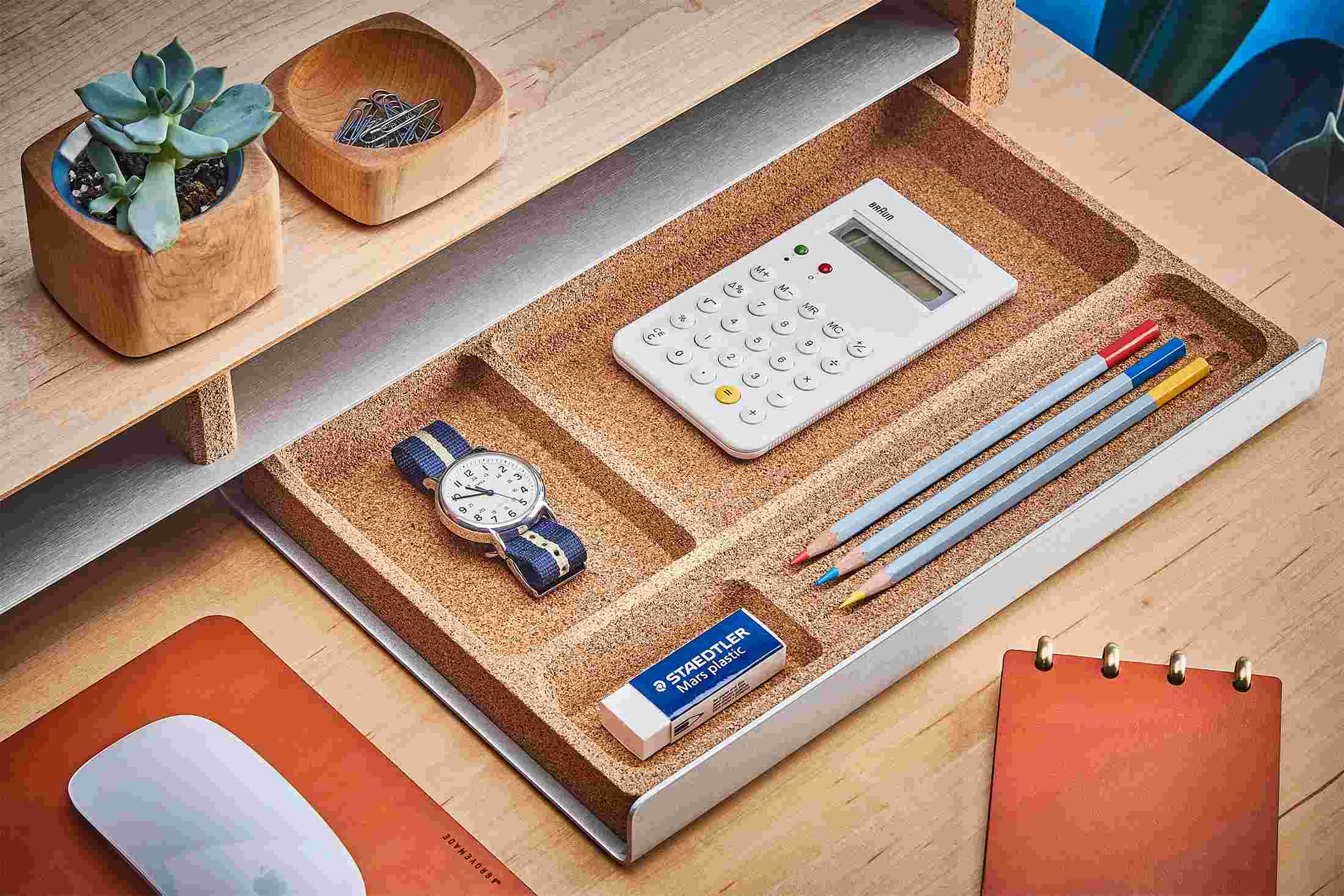 The Desk Tray in natural cork, pulled out from its hiding spot under the Maple Desk Shelf.