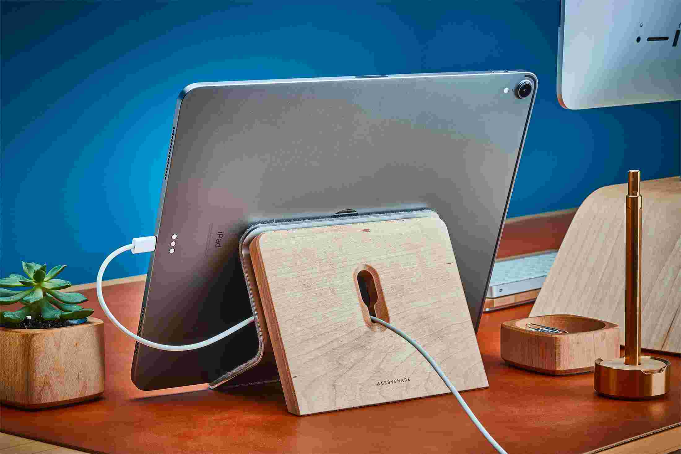 Rear detail of Maple iPad Stand cord management with keyhole for power cord.