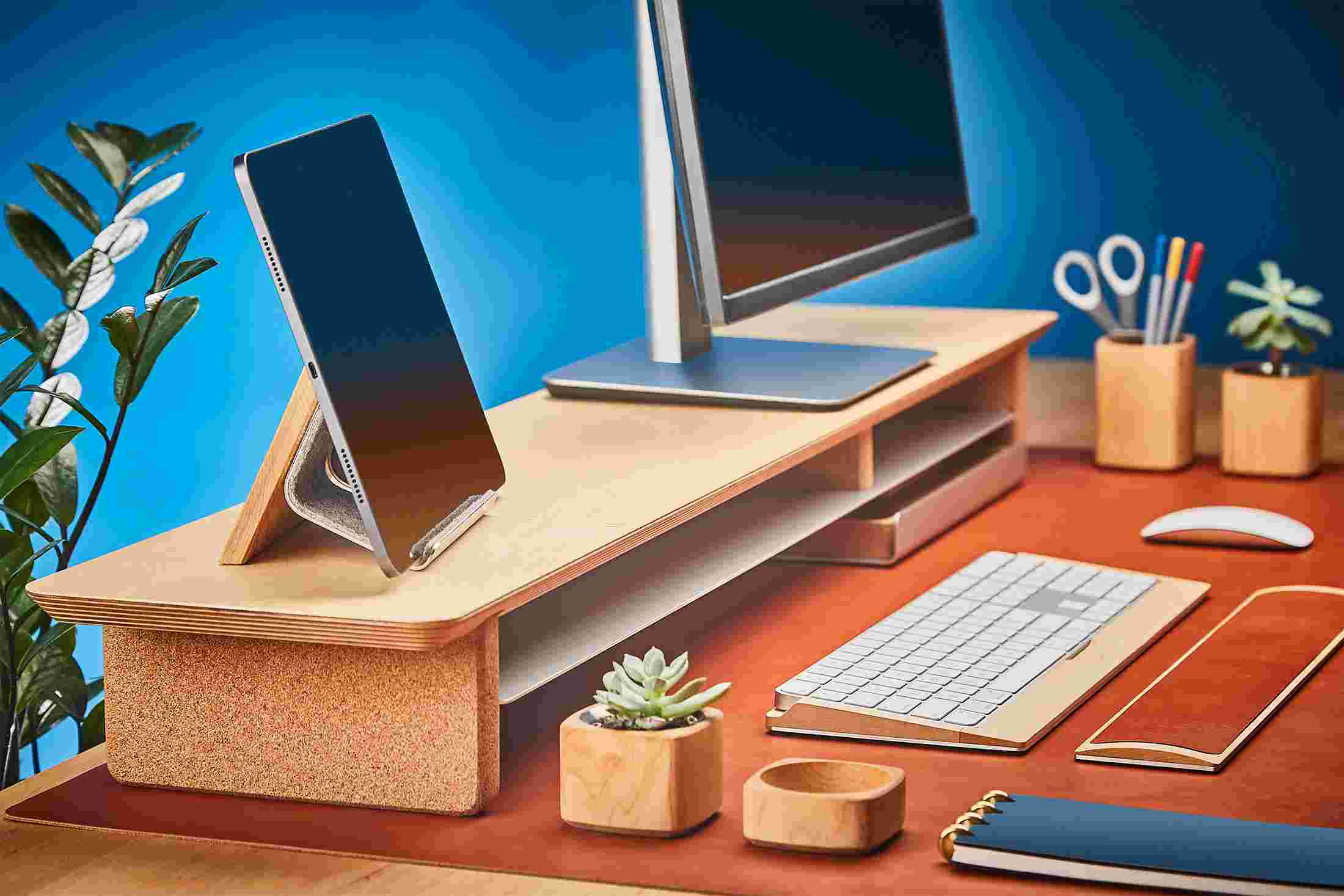 Walnut iPad Stand on the Grovemade Desk Shelf, bringing it closer to eye level next to monitor.