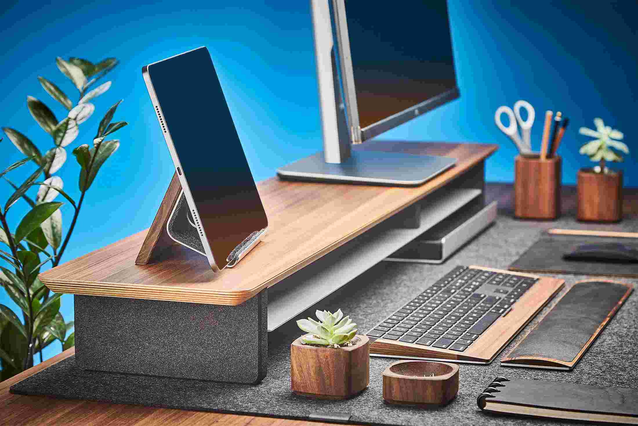 Walnut iPad Stand on the Grovemade Desk Shelf, bringing it closer to eye level next to monitor.