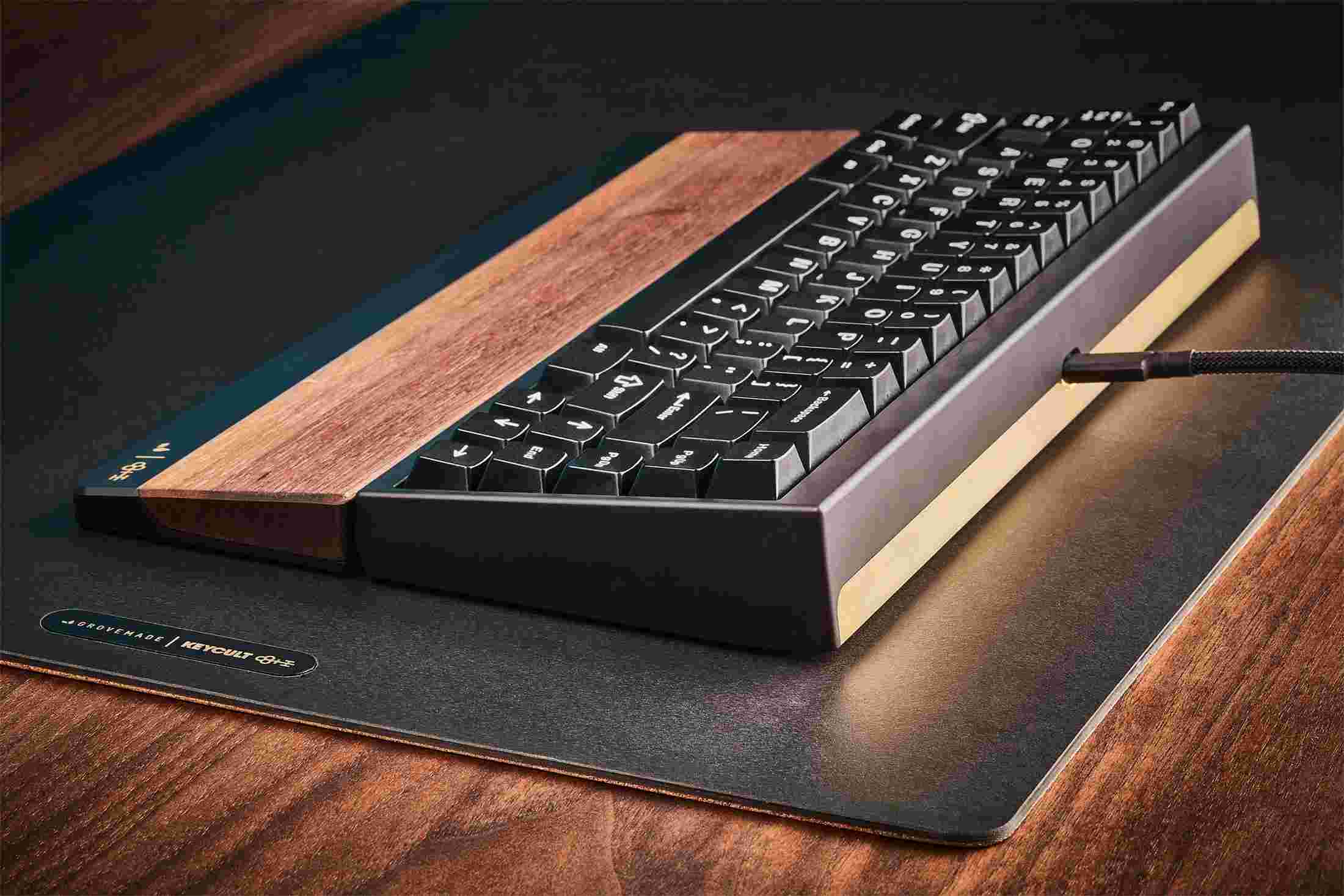 Inlaid brass detail on the rear of the Grovemade x Keycult mechanical keyboard.