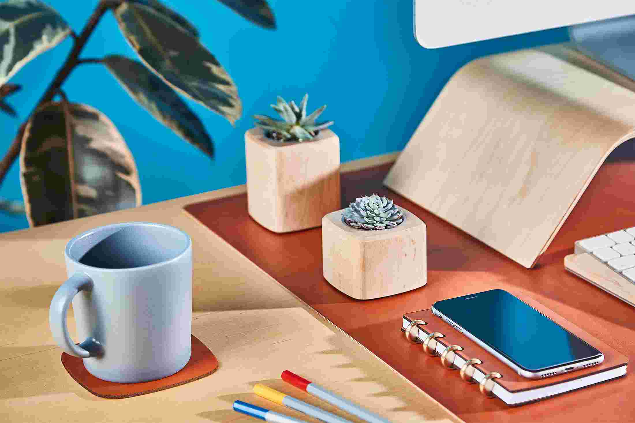 The tan leather coaster matching the Grovemade Tan Leather Desk Pad.