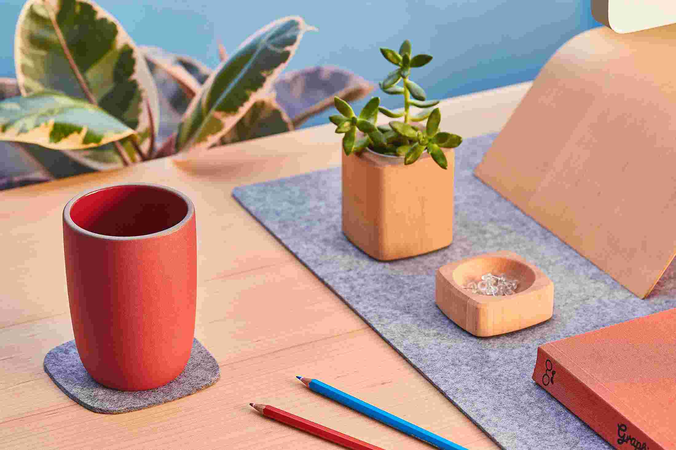 The light wool felt coaster matching the Grovemade Wool Felt Desk Pad and Desk Collection.