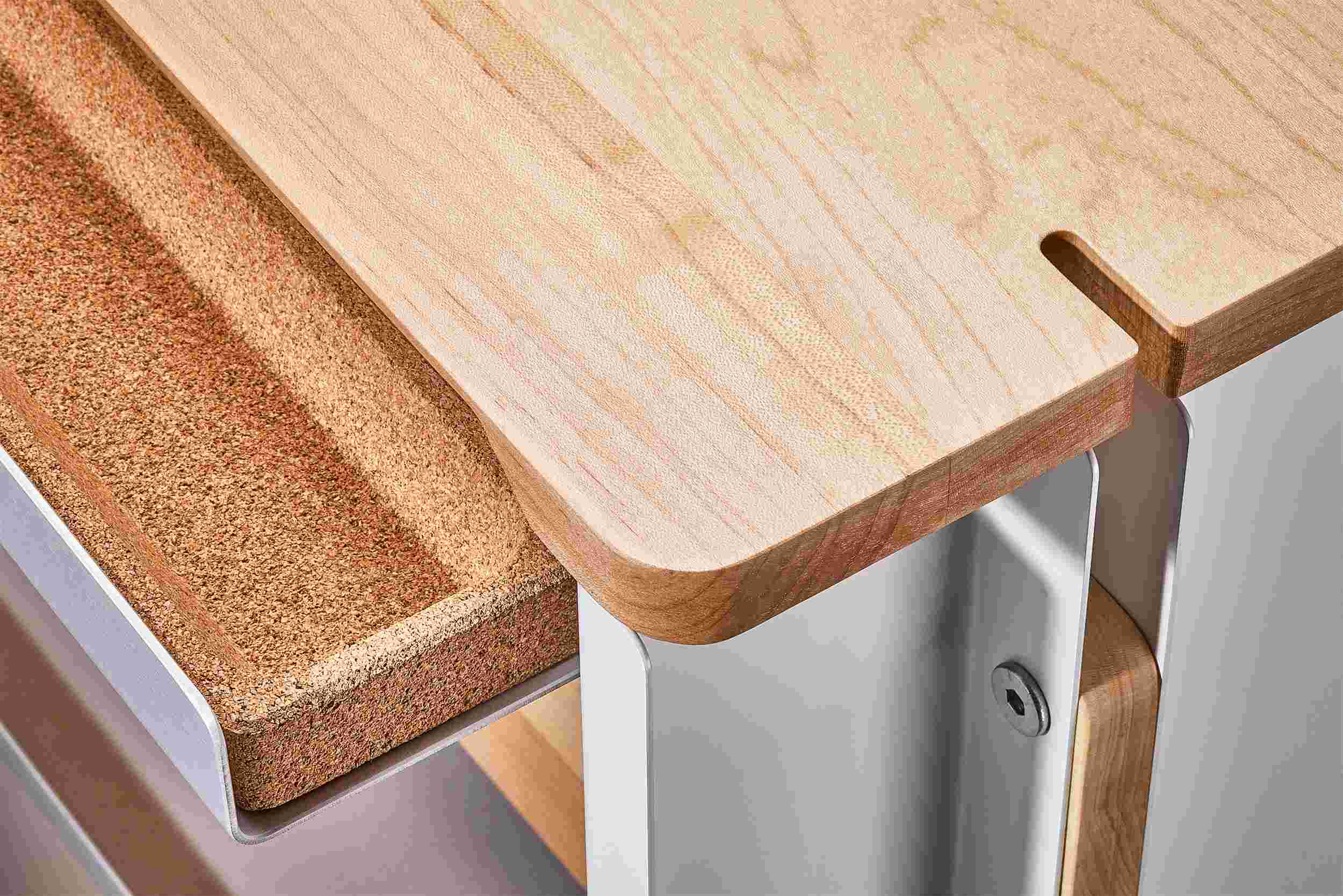 Closeup detail of the hardwood maple and natural cork drawer.