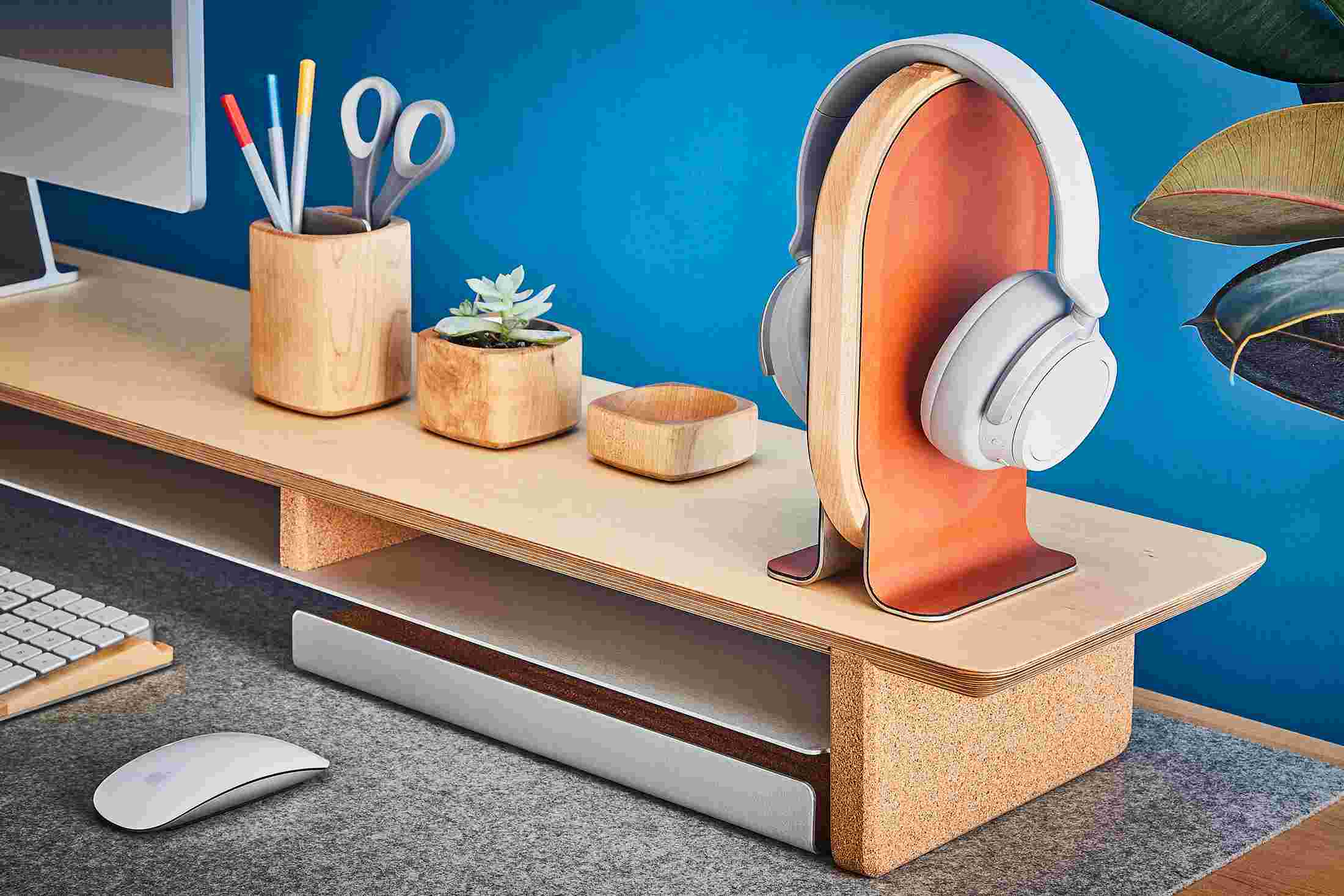 Maple wood headphone stand with premium black leather inlay on the Grovemade Wood Desk Shelf for iMac.